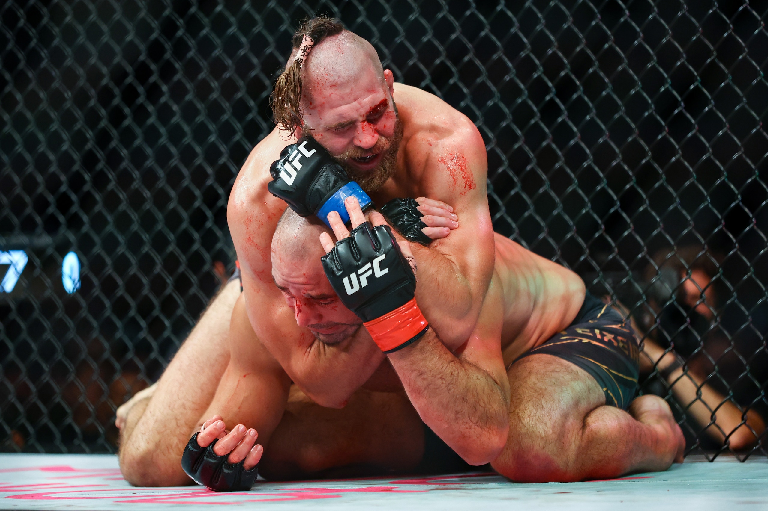 SINGAPORE, SINGAPORE - JUNE 12: Jiri Prochazka of Czech Republic submits Glover Teixeira of Brazil in the UFC light heavyweight championship fight at Singapore Indoor Stadium on June 12, 2022 in Singapore. (Photo by Yong Teck Lim/Getty Images) SINGAPORE, SINGAPORE - JUNE 12: Jiri Prochazka of Czech Republic submits Glover Teixeira of Brazil in the UFC light heavyweight championship fight at Singapore Indoor Stadium on June 12, 2022 in Singapore. (Photo by Yong Teck Lim/Getty Images)