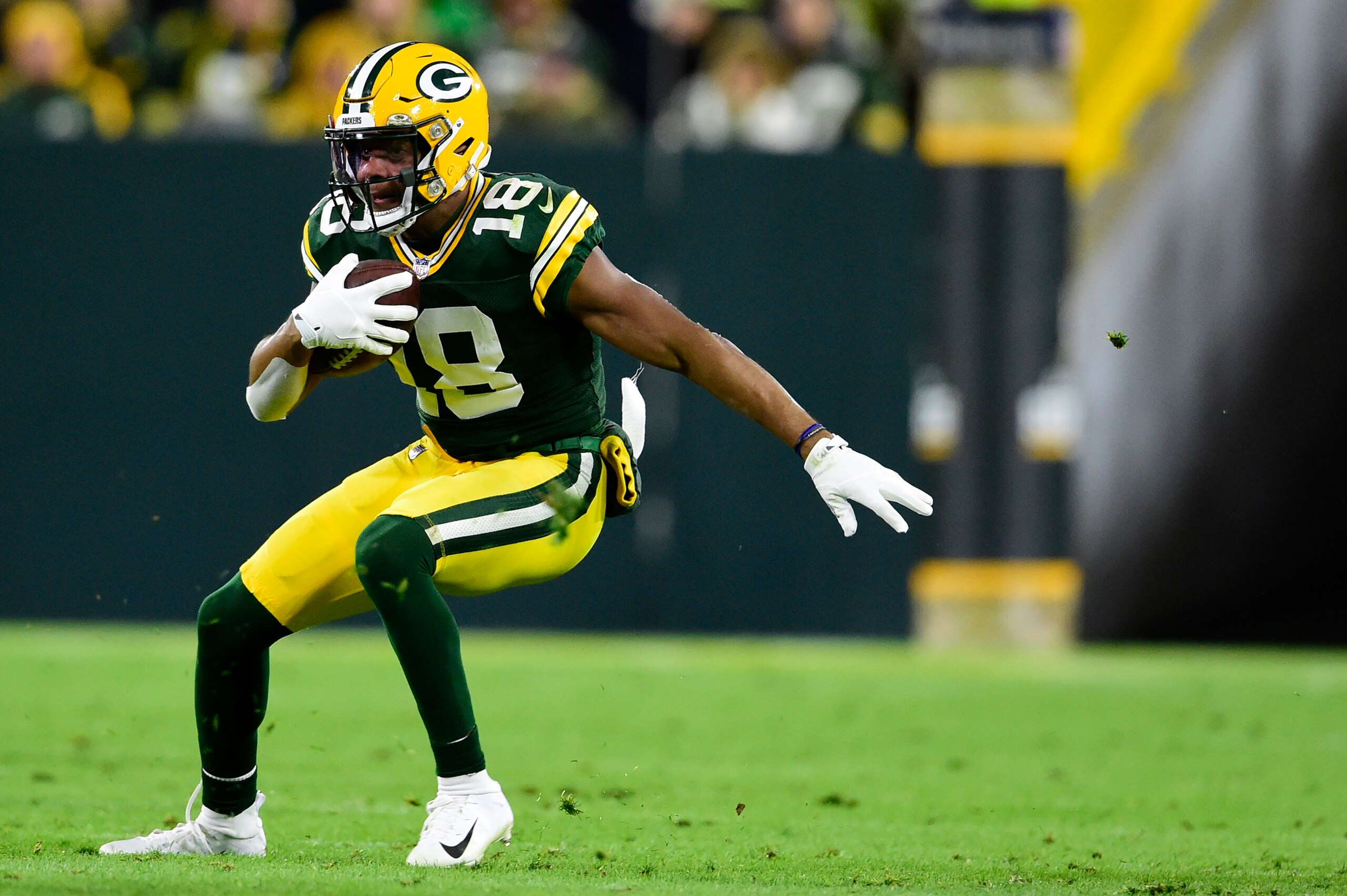 GREEN BAY, WISCONSIN - NOVEMBER 14: Randall Cobb #18 of the Green Bay Packers runs with the ball against the Seattle Seahawks in the second half at Lambeau Field on November 14, 2021 in Green Bay, Wisconsin. (Photo by Patrick McDermott/Getty Images)
