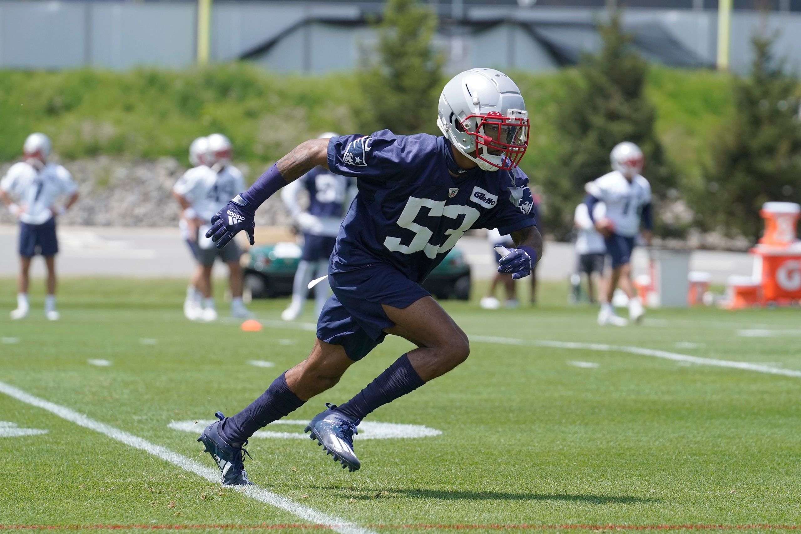 New England Patriots defensive back Jack Jones takes part in drills at the NFL football team's practice facility, Tuesday, June 7, 2022, in Foxborough, Mass. (AP Photo/Steven Senne)