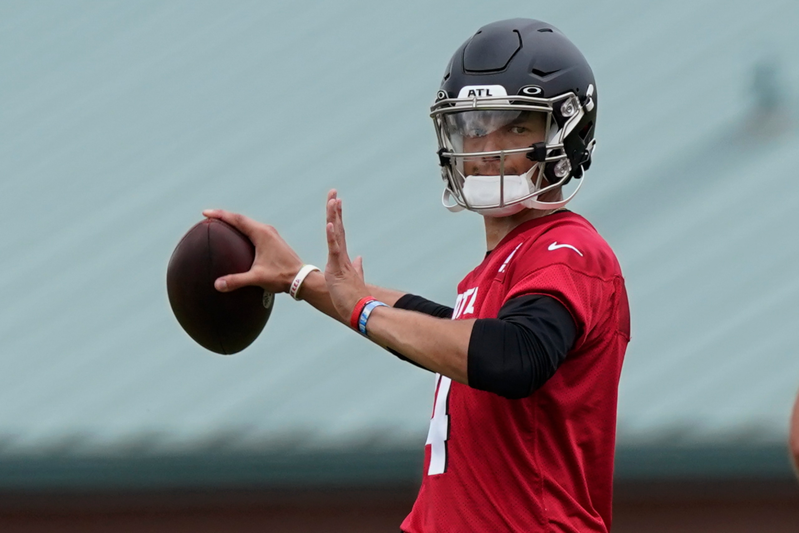 Atlanta Falcons rookie quarterback Desmond Ridder throws a pass during their NFL rookie minicamp football practice Friday, May 13, 2022, in Flowery Branch, Ga. (AP Photo/John Bazemore)
