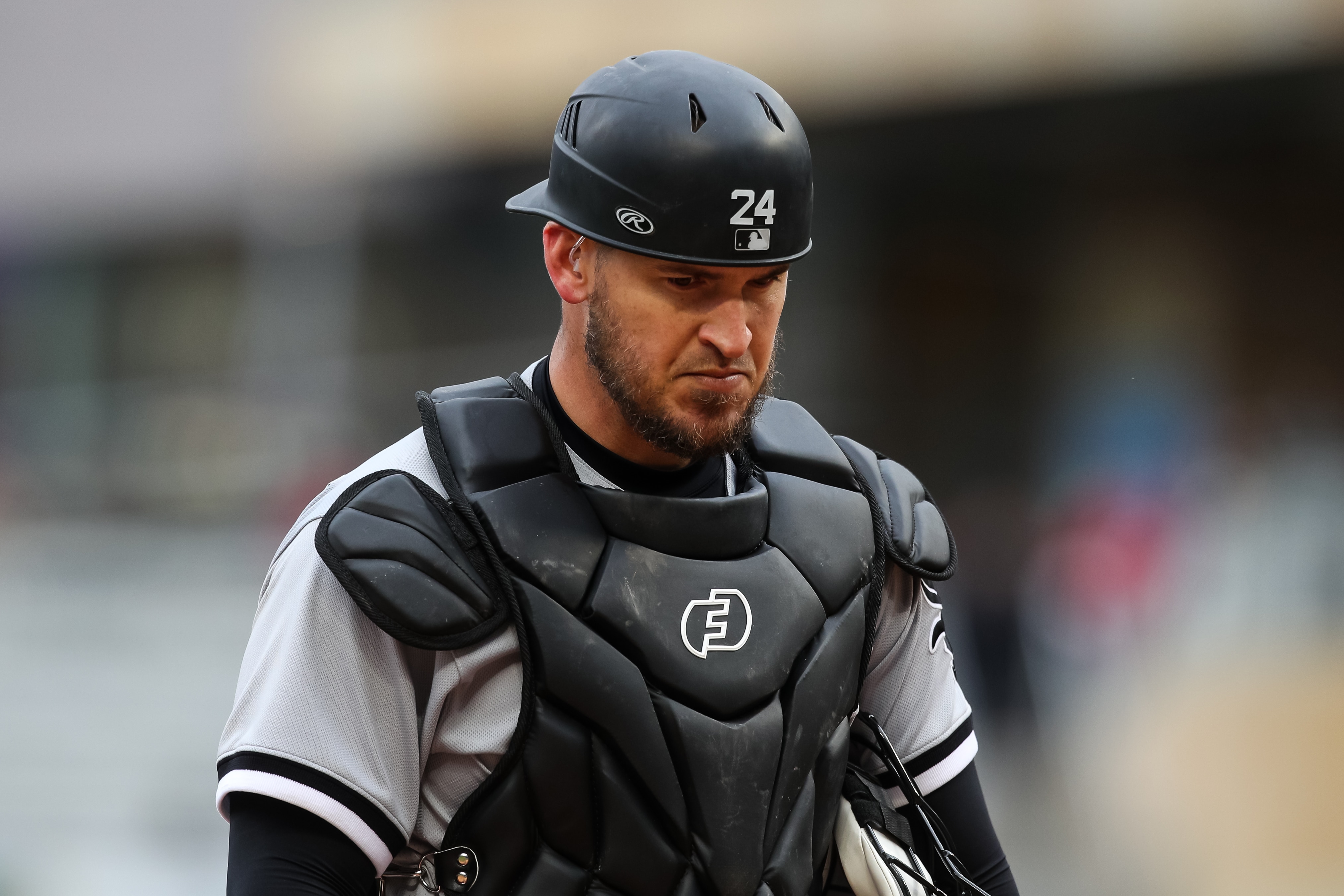 MINNEAPOLIS, MN - APRIL 24: Yasmani Grandal #24 of the Chicago White Sox looks on against the Minnesota Twins in the eighth inning of the game at Target Field on April 24, 2022 in Minneapolis, Minnesota. The Twins defeated the White Sox 6-4 in ten innings. (Photo by David Berding/Getty Images)