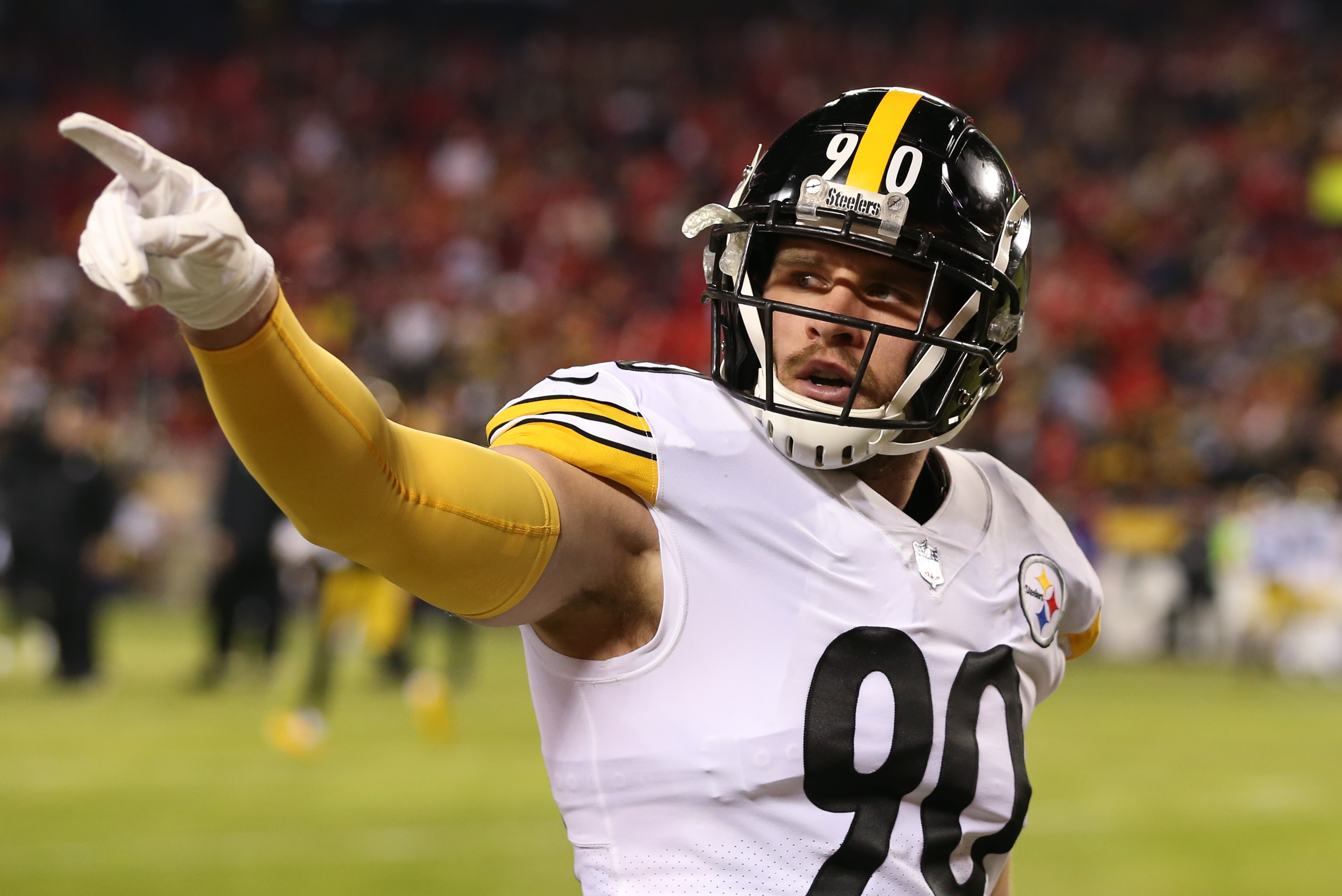 KANSAS CITY, MO - JANUARY 16: Pittsburgh Steelers outside linebacker T.J. Watt (90) points to fans before an AFC wild card playoff game between the Pittsburgh Steelers and Kansas City Chiefs on Jan 16, 2022 at GEHA Field at Arrowhead Stadium in Kansas City, MO. (Photo by Scott Winters/Icon Sportswire via Getty Images)