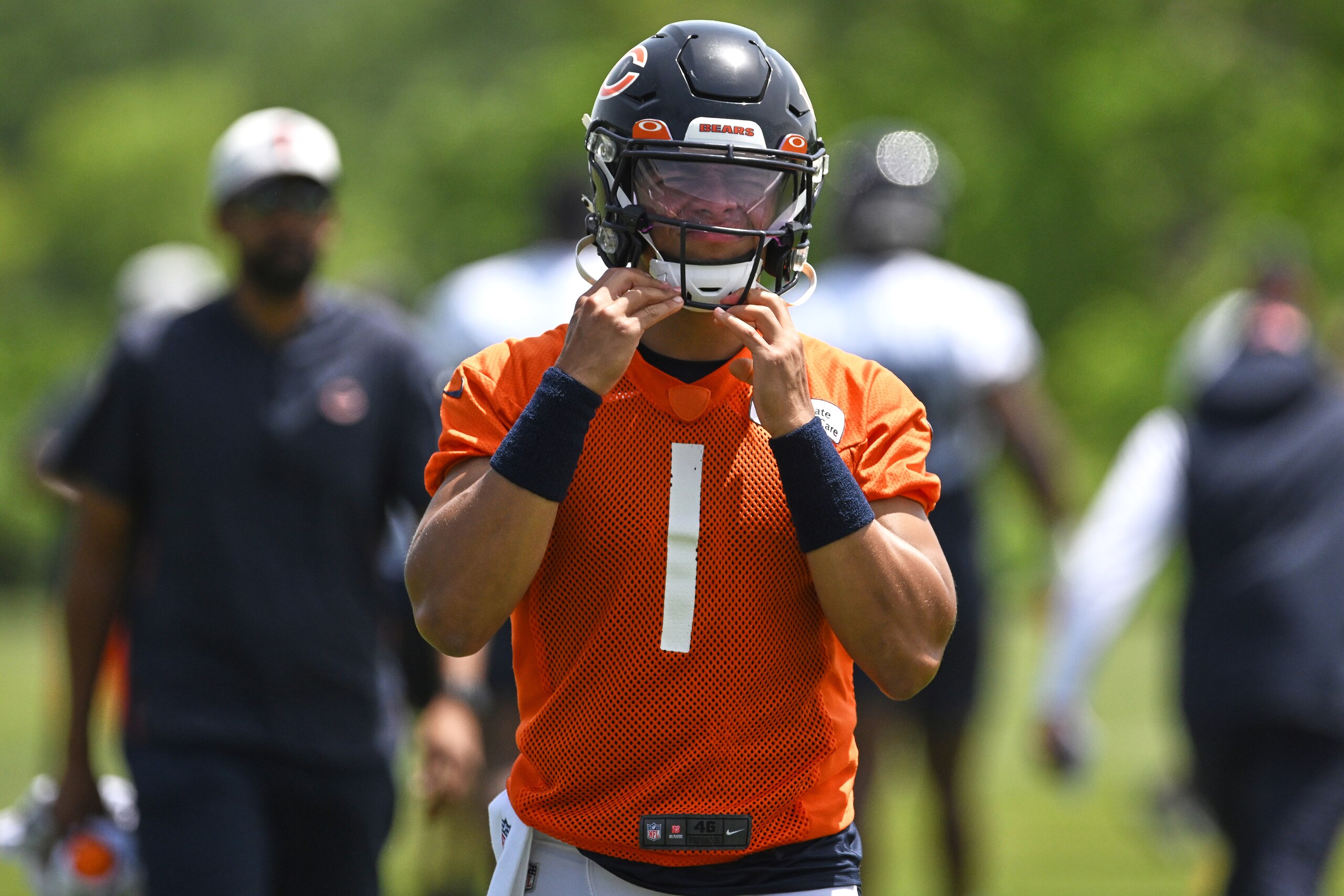 LAKE FOREST, IL - JUNE 15: Chicago Bears quarterback Justin Fields (1) adjusts his helmet during the the Chicago Bears Minicamp on June 15, 2022 at Halas Hall in Lake Forest, IL. (Photo by Robin Alam/Icon Sportswire via Getty Images)