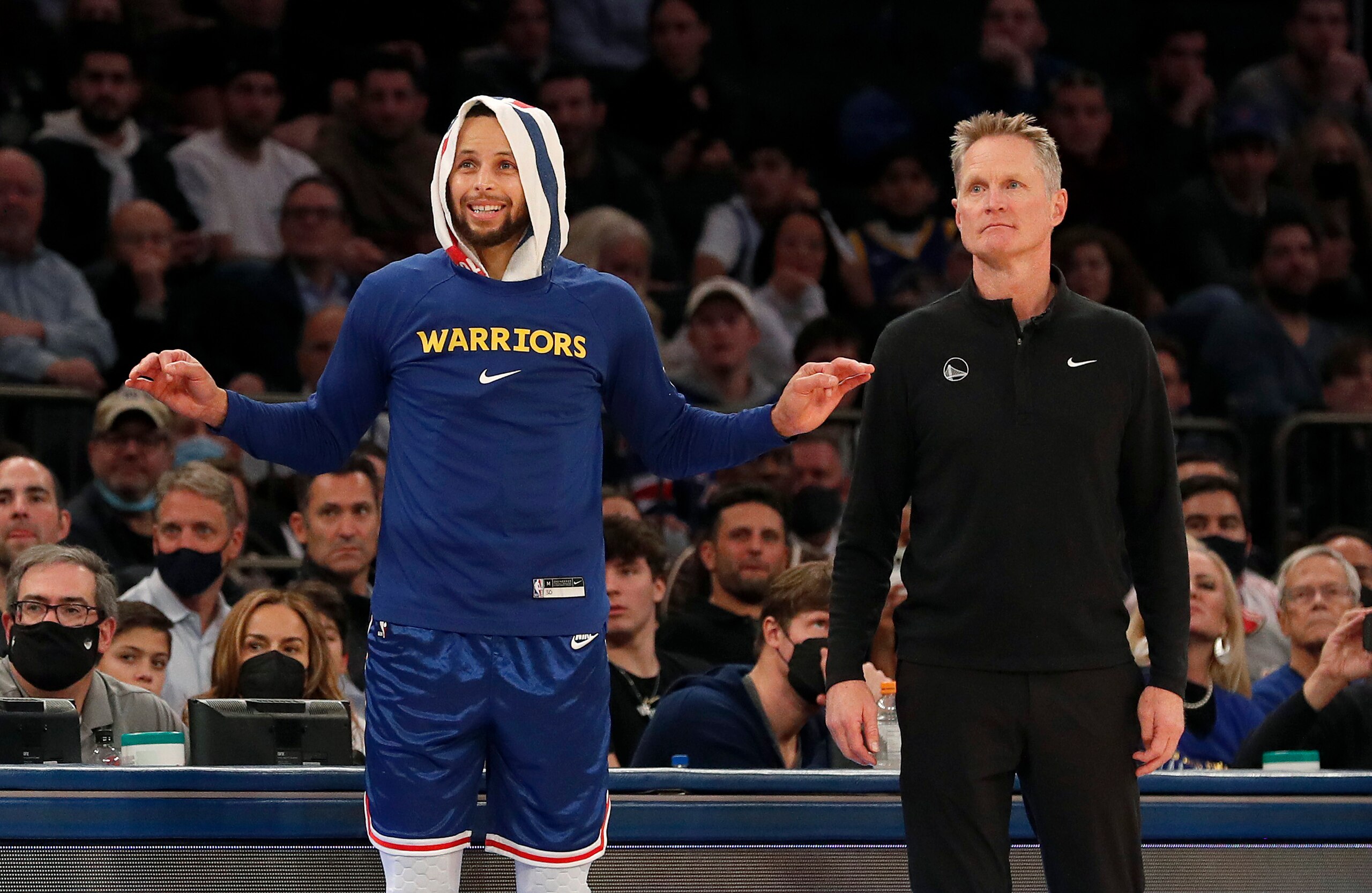 NEW YORK, NEW YORK - DECEMBER 14: (NEW YORK DAILIES OUT)  Stephen Curry #30 and head coach Steve Kerr of the Golden State Warriors in action against the New York Knicks at Madison Square Garden on December 14, 2021 in New York City. The Warriors defeated the Knicks 105-96. NOTE TO USER: User expressly acknowledges and agrees that, by downloading and or using this photograph, user is consenting to the terms and conditions of the Getty Images License Agreement. (Photo by Jim McIsaac/Getty Images)