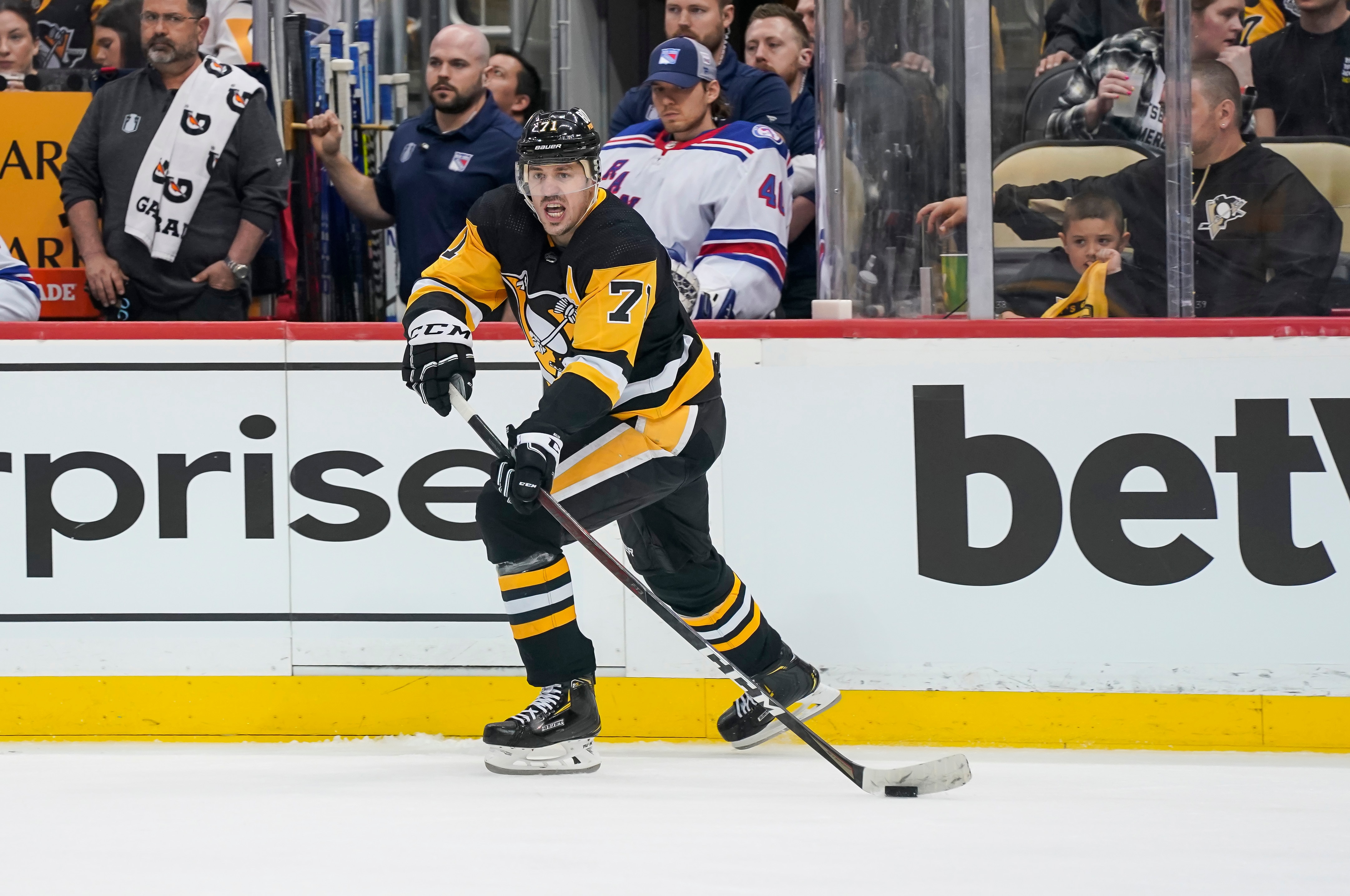 PITTSBURGH, PA - MAY 13: Pittsburgh Penguins center Evgeni Malkin (71) moves the puck during the second period in Game Six of the First Round in the 2022 NHL Stanley Cup Playoffs between the New York Rangers and the Pittsburgh Penguins on May 13, 2022, at PPG Paints Arena in Pittsburgh, PA. (Photo by Jeanine Leech/Icon Sportswire via Getty Images)