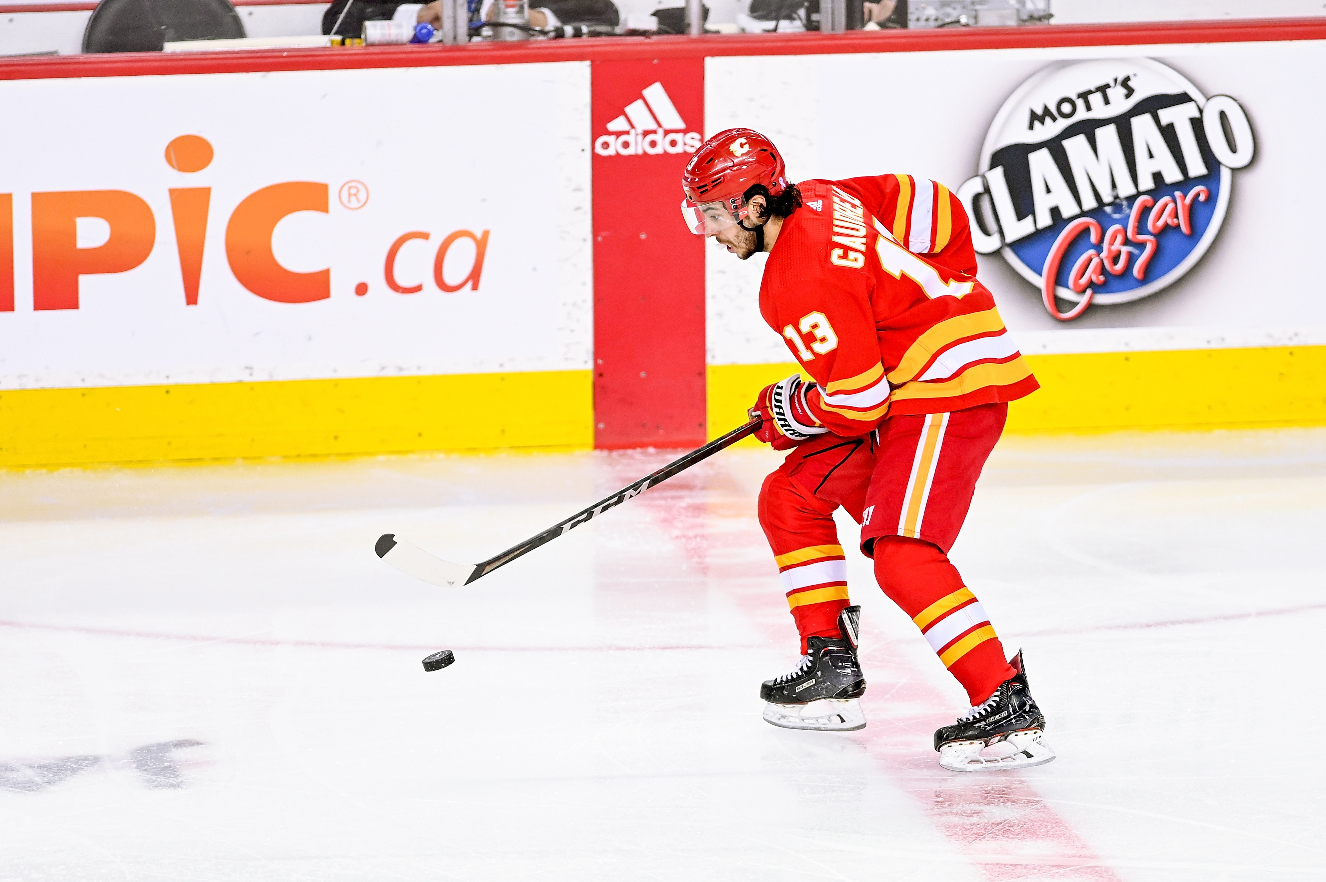 CALGARY, AB - MAY 26: Calgary Flames Left Wing Johnny Gaudreau (13) skates with the puck during the second period of game 5 of the second round of the NHL Stanley Cup Playoffs between the Calgary Flames and the Edmonton Oilers on May 26, 2022, at the Scotiabank Saddledome in Calgary, AB. (Photo by Brett Holmes/Icon Sportswire via Getty Images)