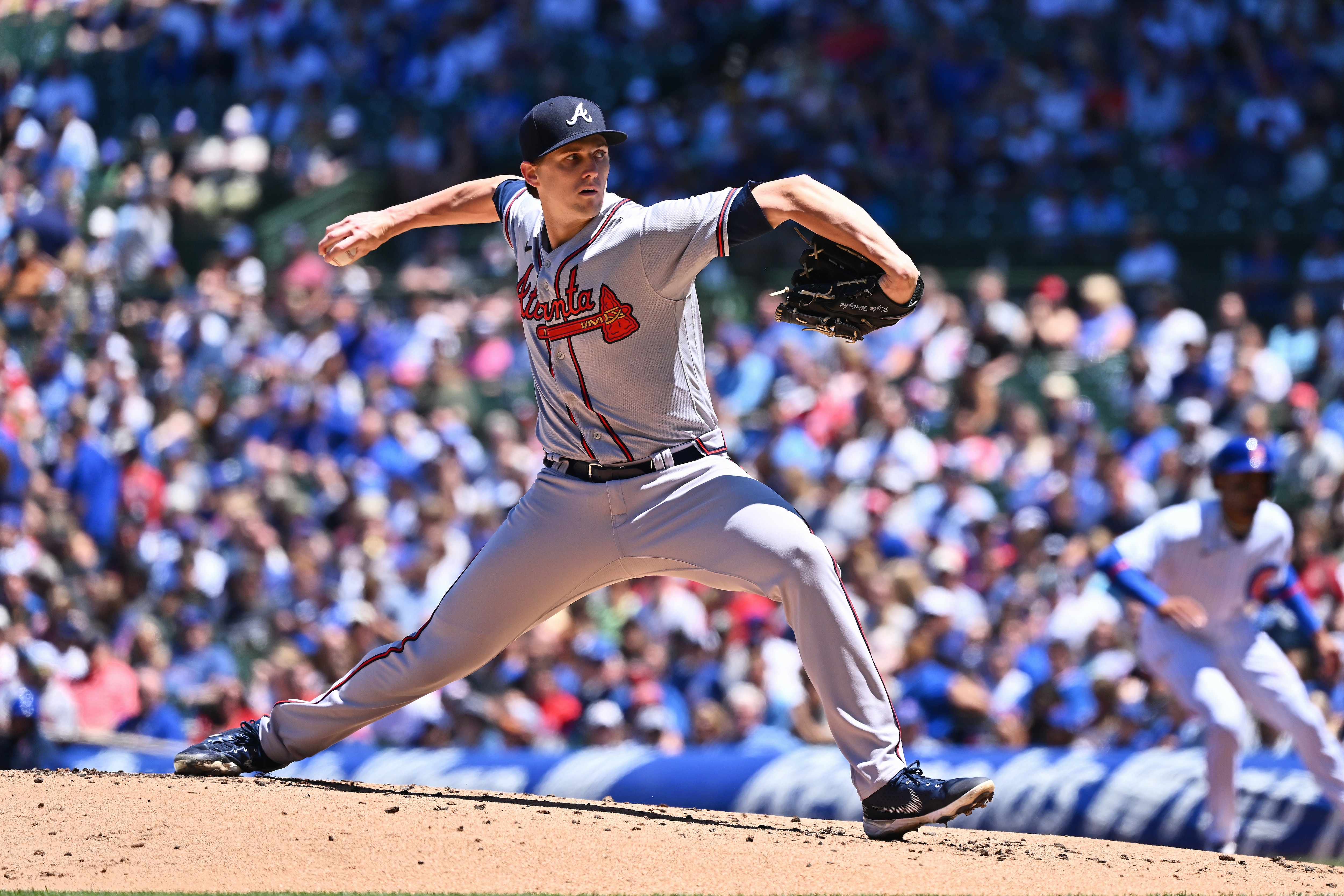 CHICAGO, IL - JUNE 18:  Kyle Wright #30 of the Atlanta Braves pitches against the Chicago Cubs at Wrigley Field on June 18, 2022 in Chicago, Illinois.  (Photo by Jamie Sabau/Getty Images)