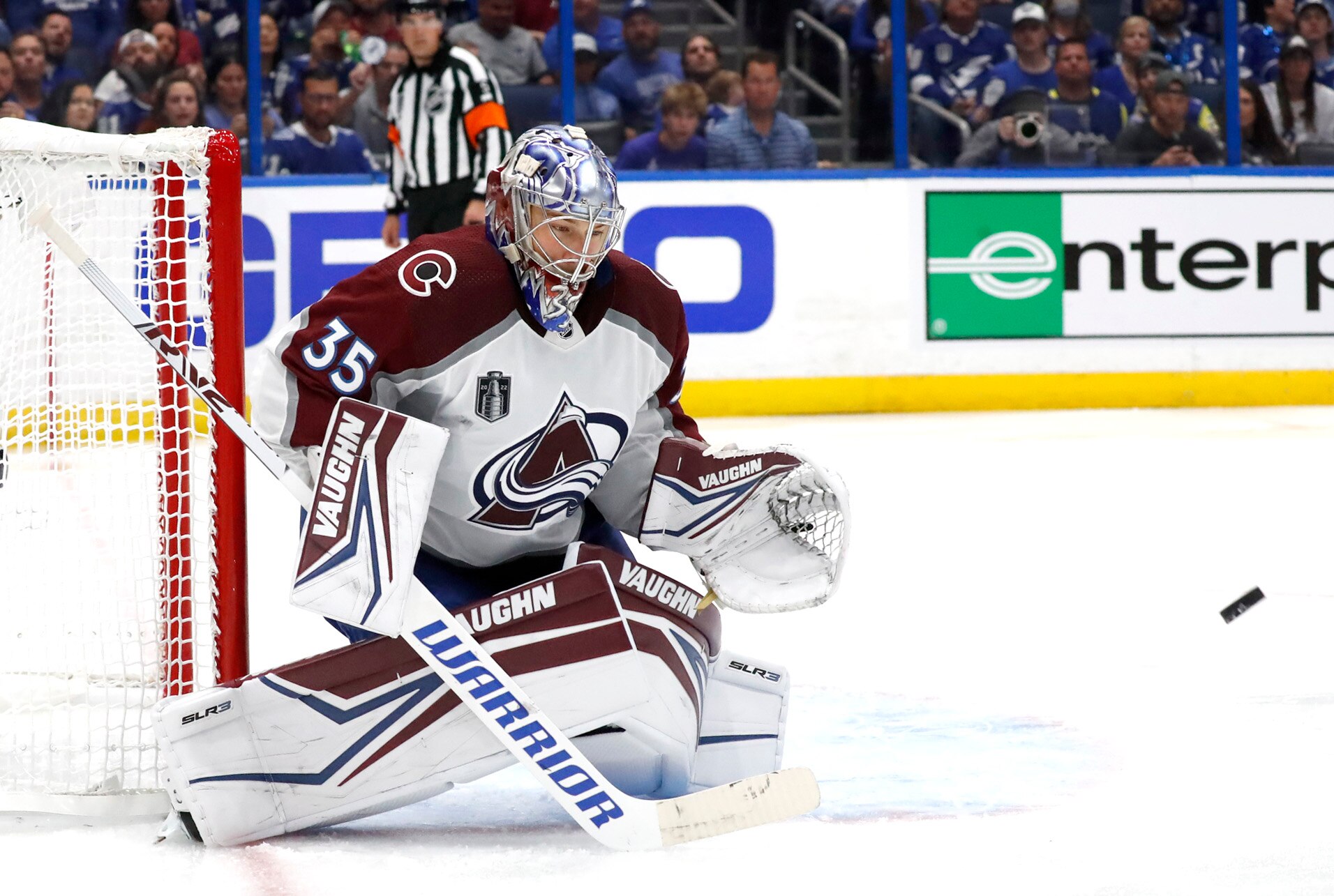 TAMPA, FLORIDA - JUNE 22:  Goaltender Darcy Kuemper #35 of the Colorado Avalanche makes a save against the Tampa Bay Lightning in the second period Game Three of the 2022 NHL Stanley Cup Final at Amalie Arena on June 22, 2022 in Tampa, Florida. (Photo by Eliot J. Schechter/2022 NHLI)
