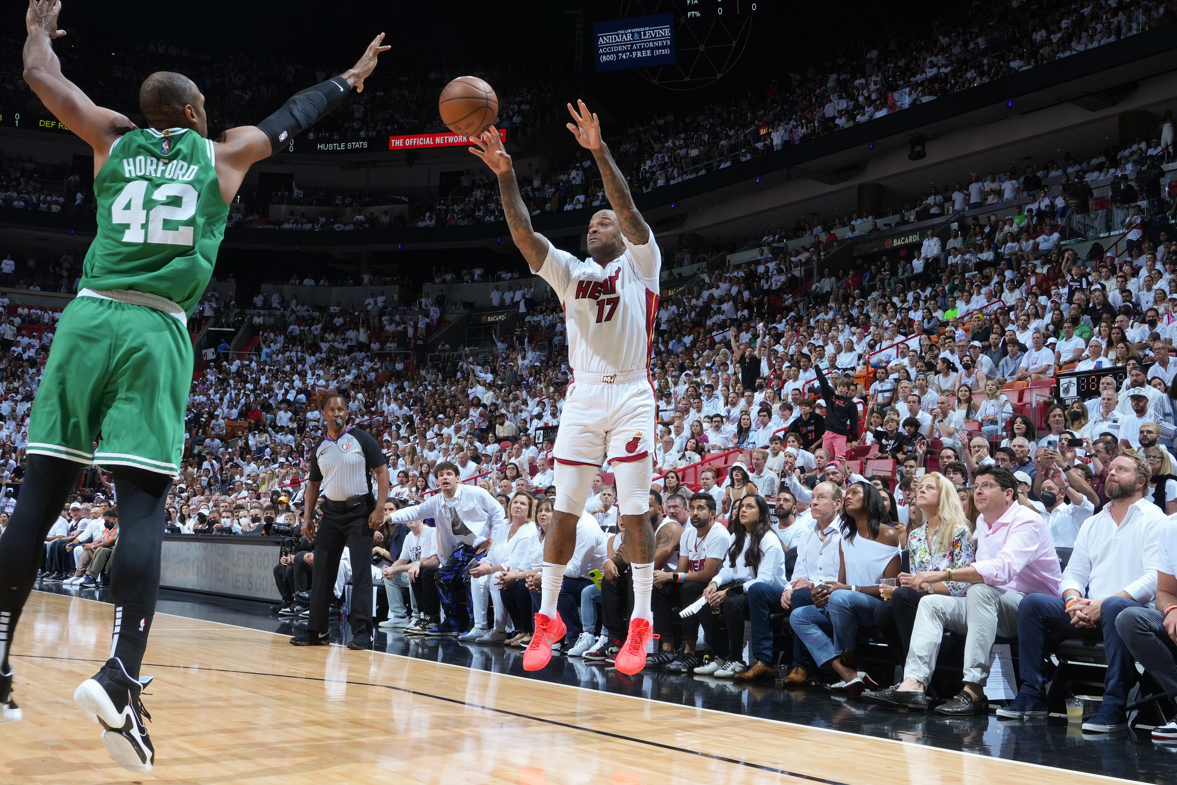 MIAMI, FL - MAY 29: P.J. Tucker #17 of the Miami Heat shoots a three point basket against the Boston Celtics during Game 7 of the 2022 NBA Playoffs Eastern Conference Finals on May 29, 2022 at FTX Arena in Miami, Florida. NOTE TO USER: User expressly acknowledges and agrees that, by downloading and or using this Photograph, user is consenting to the terms and conditions of the Getty Images License Agreement. Mandatory Copyright Notice: Copyright 2022 NBAE (Photo by Jesse D. Garrabrant/NBAE via Getty Images)