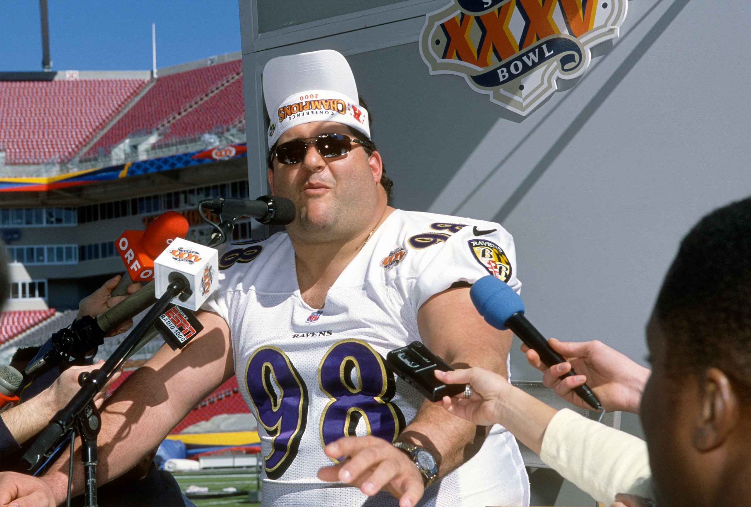 TAMPA, FL - JANUARY 28:  Tony Siragusa #98 of the Baltimore Ravens talks with the media prior to play the New York Giants in Super Bowl XXXV at Raymond James Stadium on January 28, 2001 in Tampa, Florida. The Ravens won the game 34-7. (Photo by Focus on Sport/Getty Images)