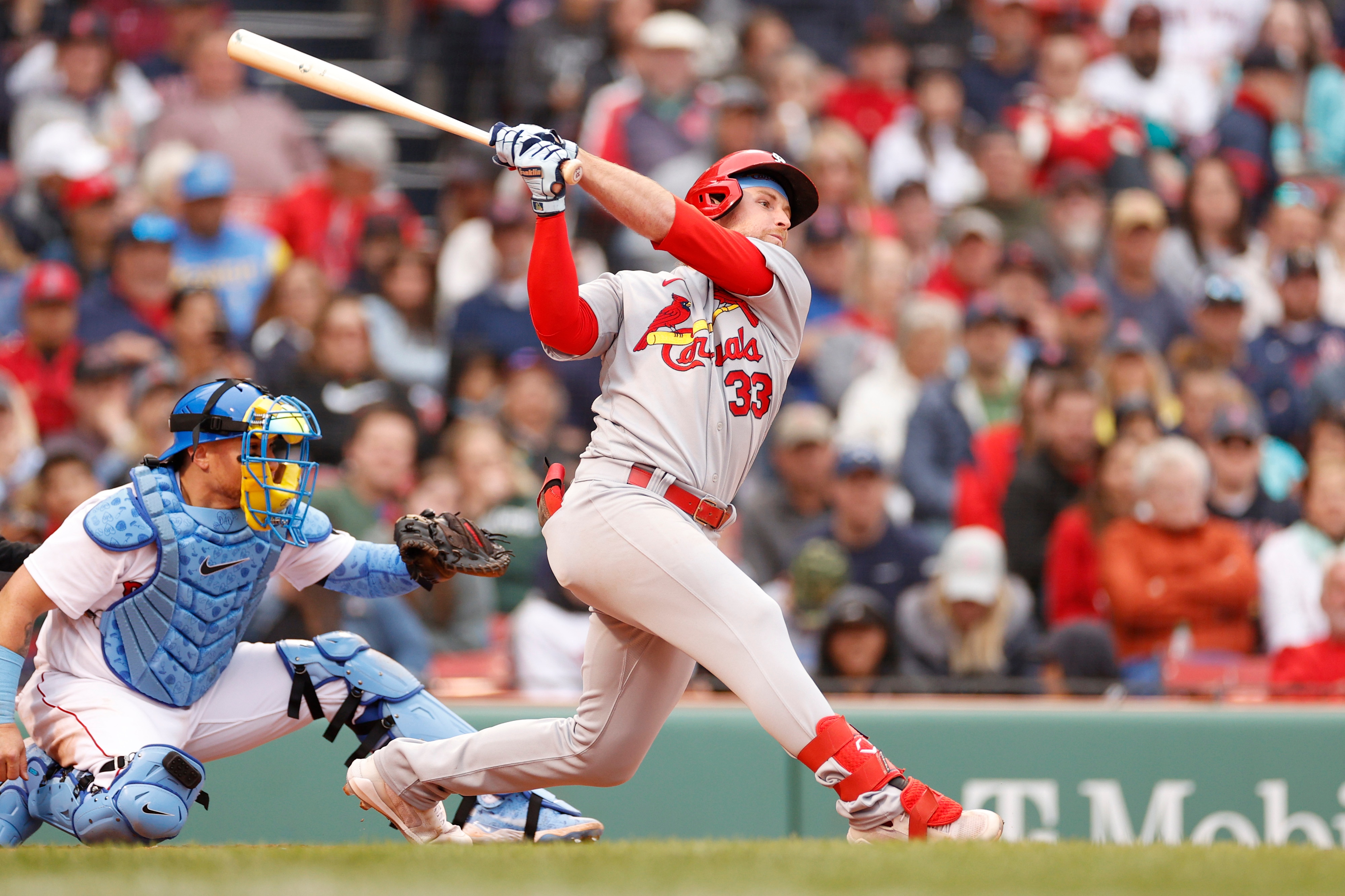 BOSTON, MASSACHUSETTS - JUNE 19: Brendan Donovan #33 of the St. Louis Cardinals swings at a pitch during the eighth inning against the Boston Red Sox at Fenway Park on June 19, 2022 in Boston, Massachusetts. (Photo by Sarah Stier/Getty Images)