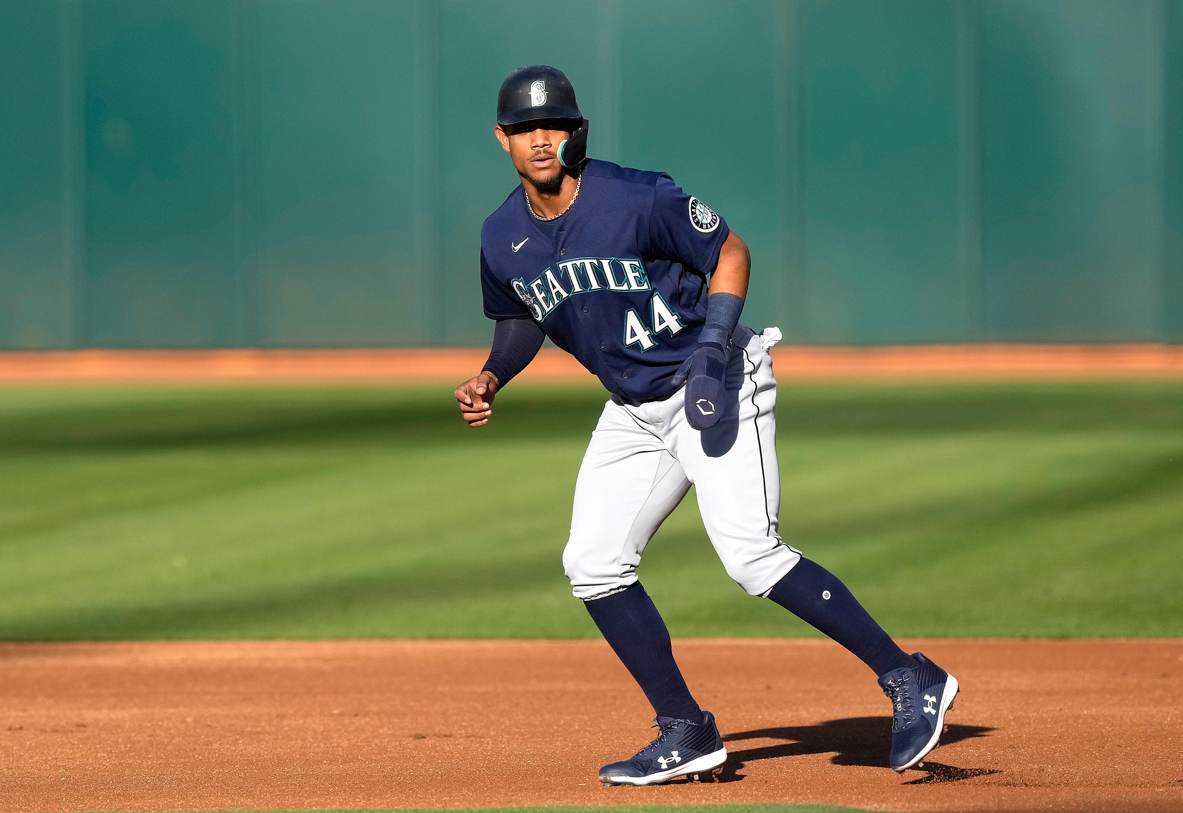 OAKLAND, CALIFORNIA - JUNE 21: Julio Rodriguez #44 of the Seattle Mariners leads off of first base against the Oakland Athletics in the top of the first inning at RingCentral Coliseum on June 21, 2022 in Oakland, California. (Photo by Thearon W. Henderson/Getty Images)