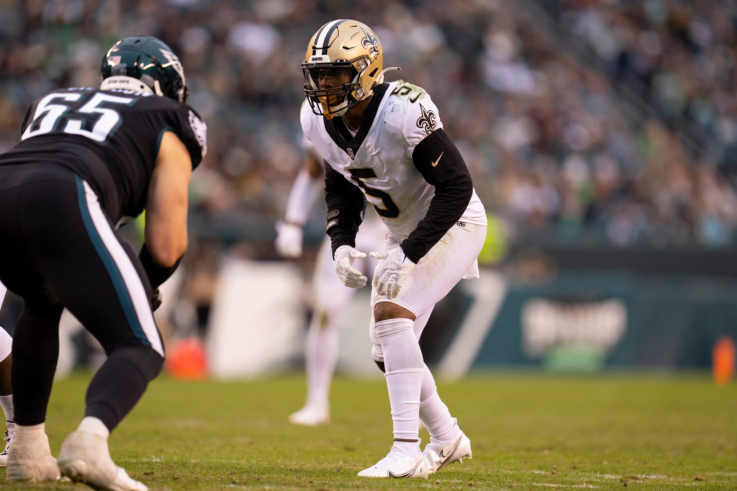 PHILADELPHIA, PA - NOVEMBER 21: Kwon Alexander #5 of the New Orleans Saints lines up against Lane Johnson #65 of the Philadelphia Eagles at Lincoln Financial Field on November 21, 2021 in Philadelphia, Pennsylvania. (Photo by Mitchell Leff/Getty Images)