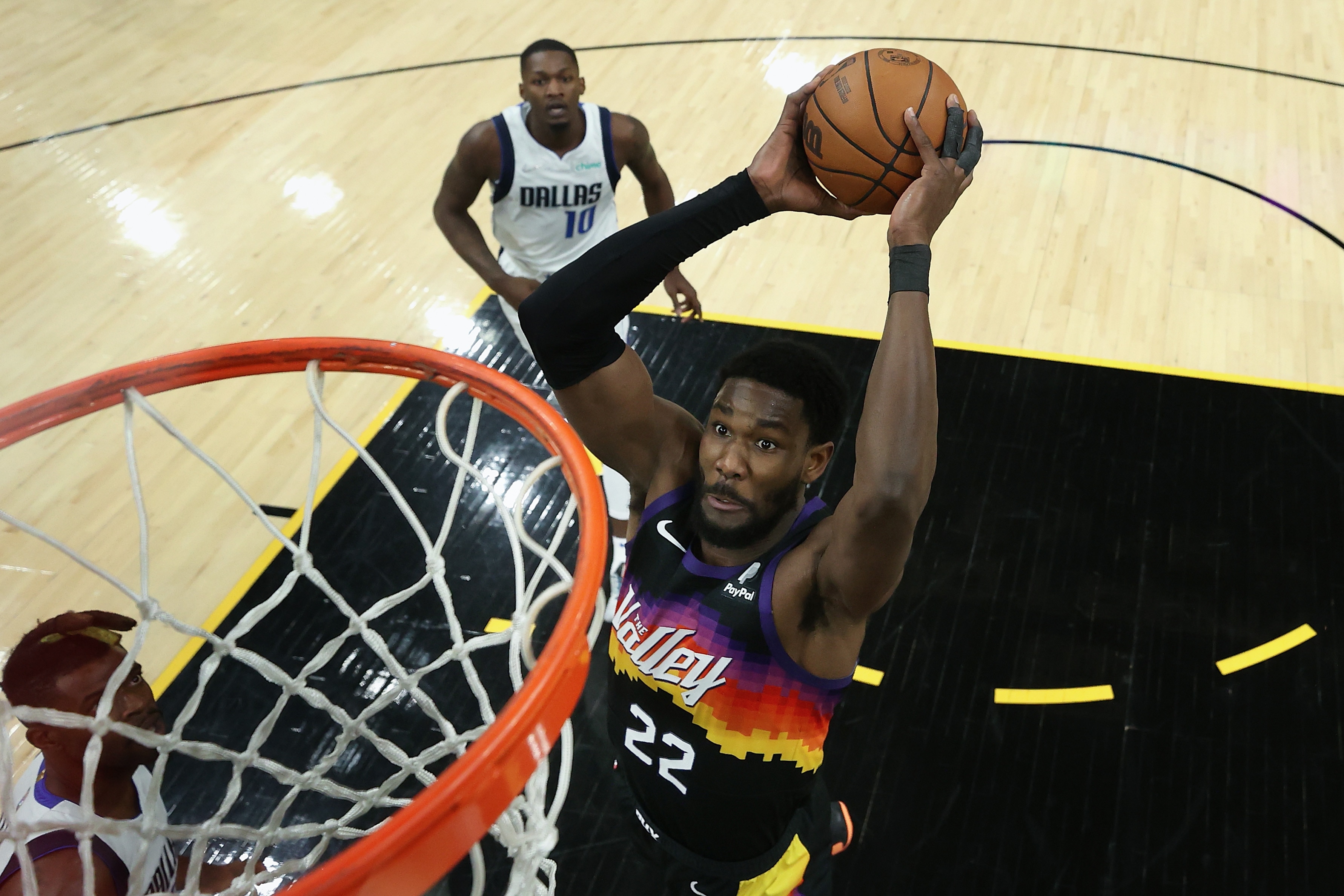 PHOENIX, ARIZONA - MAY 04: Deandre Ayton #22 of the Phoenix Suns slam dunks against the Dallas Mavericks during the second half of Game Two of the Western Conference Second Round NBA Playoffs at Footprint Center on May 04, 2022 in Phoenix, Arizona.  The Suns defeated the Mavericks 129-109. NOTE TO USER: User expressly acknowledges and agrees that, by downloading and or using this photograph, User is consenting to the terms and conditions of the Getty Images License Agreement. (Photo by Christian Petersen/Getty Images)