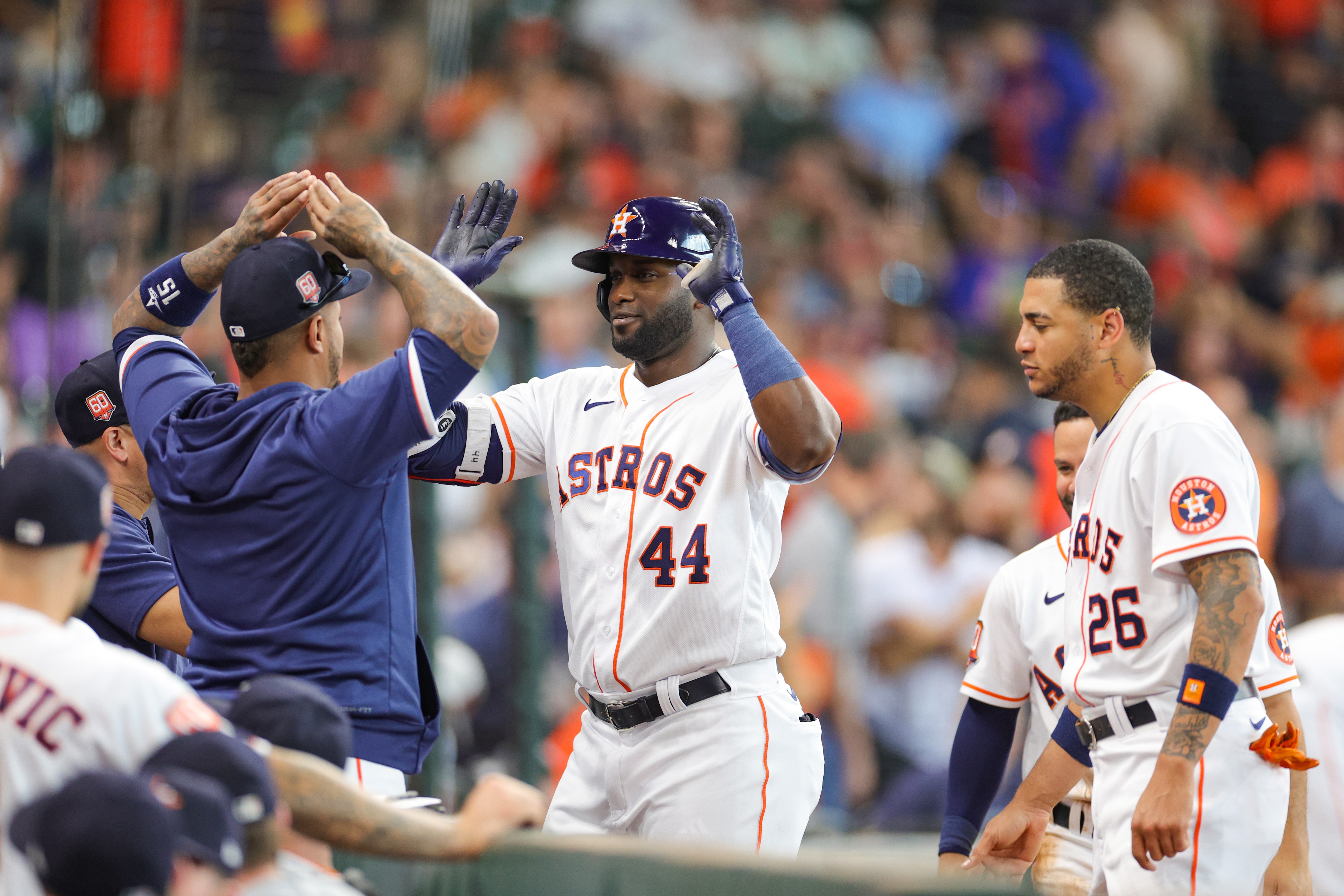 HOUSTON, TEXAS - JUNE 22: Yordan Alvarez #44 of the Houston Astros high fives teammates after hitting a home run during the third inning against the New York Mets at Minute Maid Park on June 22, 2022 in Houston, Texas. (Photo by Carmen Mandato/Getty Images)
