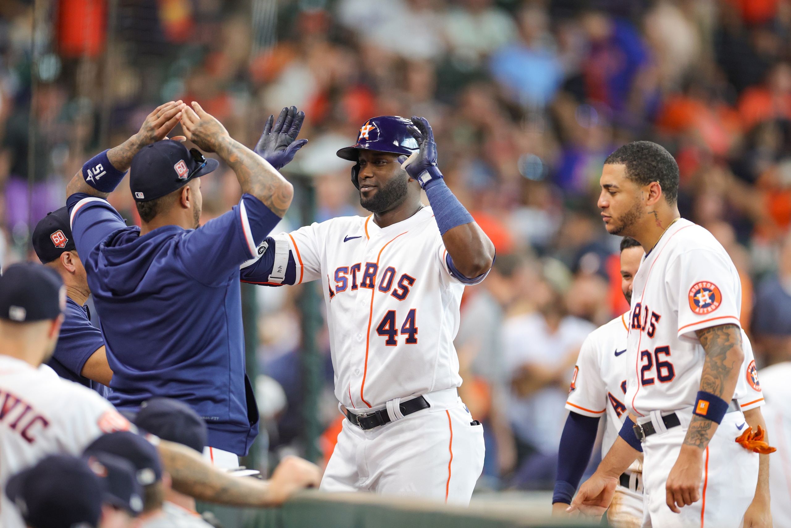 HOUSTON, TEXAS - JUNE 22: Yordan Alvarez #44 of the Houston Astros high fives teammates after hitting a home run during the third inning against the New York Mets at Minute Maid Park on June 22, 2022 in Houston, Texas. (Photo by Carmen Mandato/Getty Images)