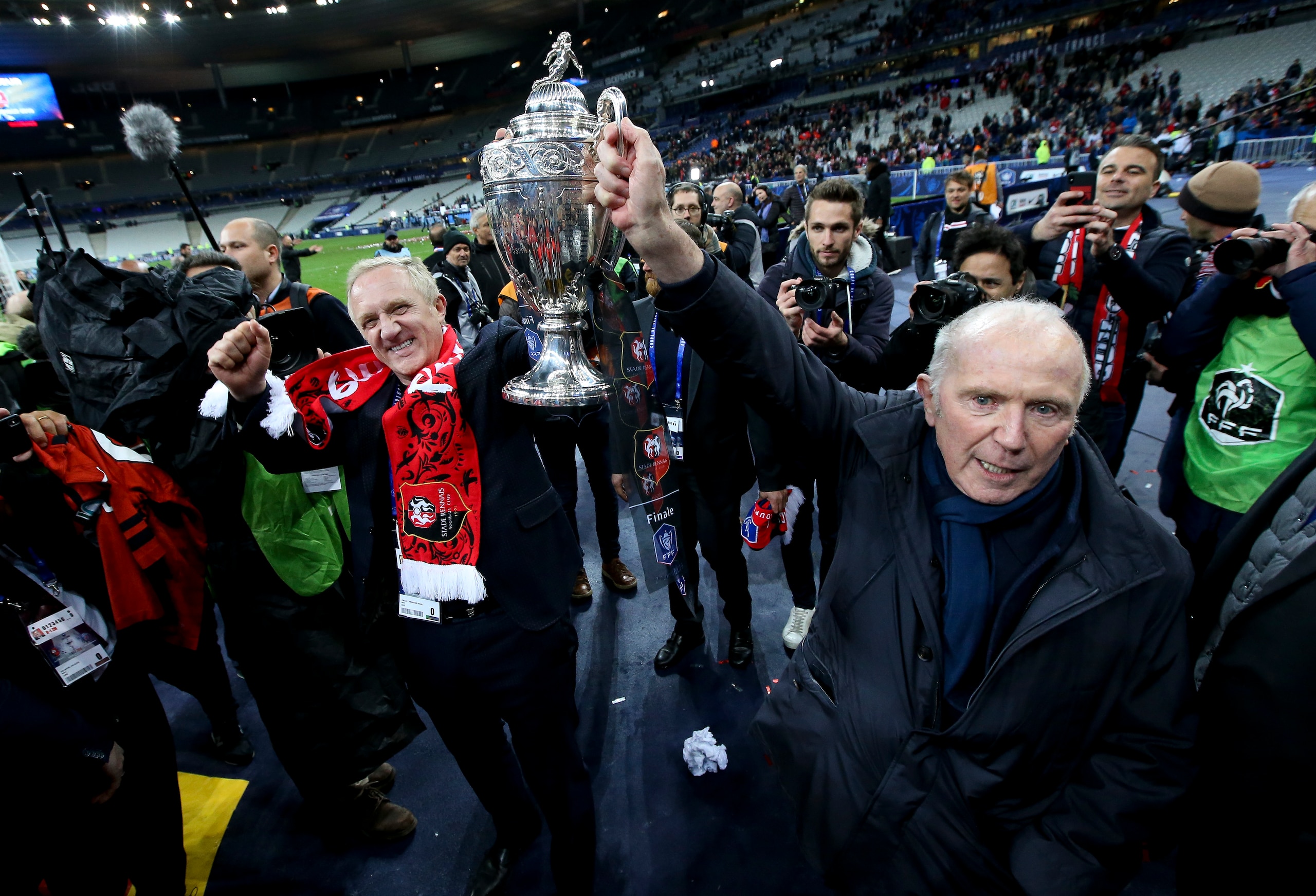PARIS, FRANCE - APRIL 27: CEO of Kering and owner of Stade Rennais Francois-Henri Pinault and his father Francois Pinault, founder of Kering and Stade Rennais celebrate the victory holding the French Cup following the French Cup Final (Coupe de France) between Stade Rennais (Rennes) and Paris Saint-Germain (PSG) at Stade de France on April 27, 2019 in Saint-Denis near Paris, France. (Photo by Jean Catuffe/Getty Images) PARIS, FRANCE - APRIL 27: CEO of Kering and owner of Stade Rennais Francois-Henri Pinault and his father Francois Pinault, founder of Kering and Stade Rennais celebrate the victory holding the French Cup following the French Cup Final (Coupe de France) between Stade Rennais (Rennes) and Paris Saint-Germain (PSG) at Stade de France on April 27, 2019 in Saint-Denis near Paris, France. (Photo by Jean Catuffe/Getty Images)