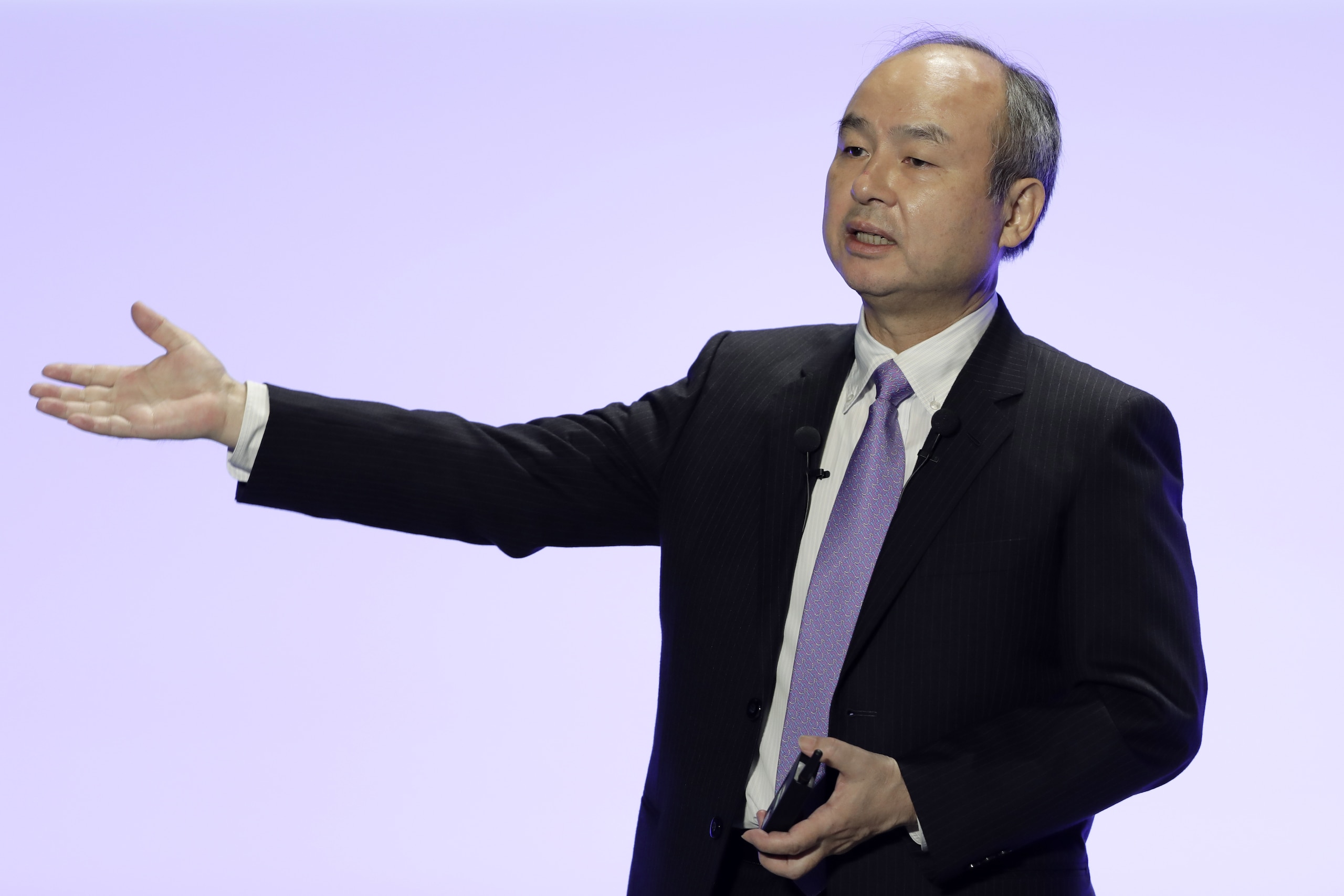 Masayoshi Son, chairman and chief executive officer of SoftBank Group Corp., delivers a keynote speech at the Junior Chamber International (JCI) World Congress in Yokohama, Japan, on Wednesday, Nov. 4, 2020. Nvidia Corp. Chief Executive Officer Jensen Huang argued on Oct. 29 that the companys proposed acquisition of chip designer Arm Ltd., owned by SoftBank, will benefit technological development, a pitch to industry customers and regulators that need to approve the record transaction. Photographer: Kiyoshi Ota/Bloomberg via Getty Images Masayoshi Son, chairman and chief executive officer of SoftBank Group Corp., delivers a keynote speech at the Junior Chamber International (JCI) World Congress in Yokohama, Japan, on Wednesday, Nov. 4, 2020. Nvidia Corp. Chief Executive Officer Jensen Huang argued on Oct. 29 that the companys proposed acquisition of chip designer Arm Ltd., owned by SoftBank, will benefit technological development, a pitch to industry customers and regulators that need to approve the record transaction. Photographer: Kiyoshi Ota/Bloomberg via Getty Images