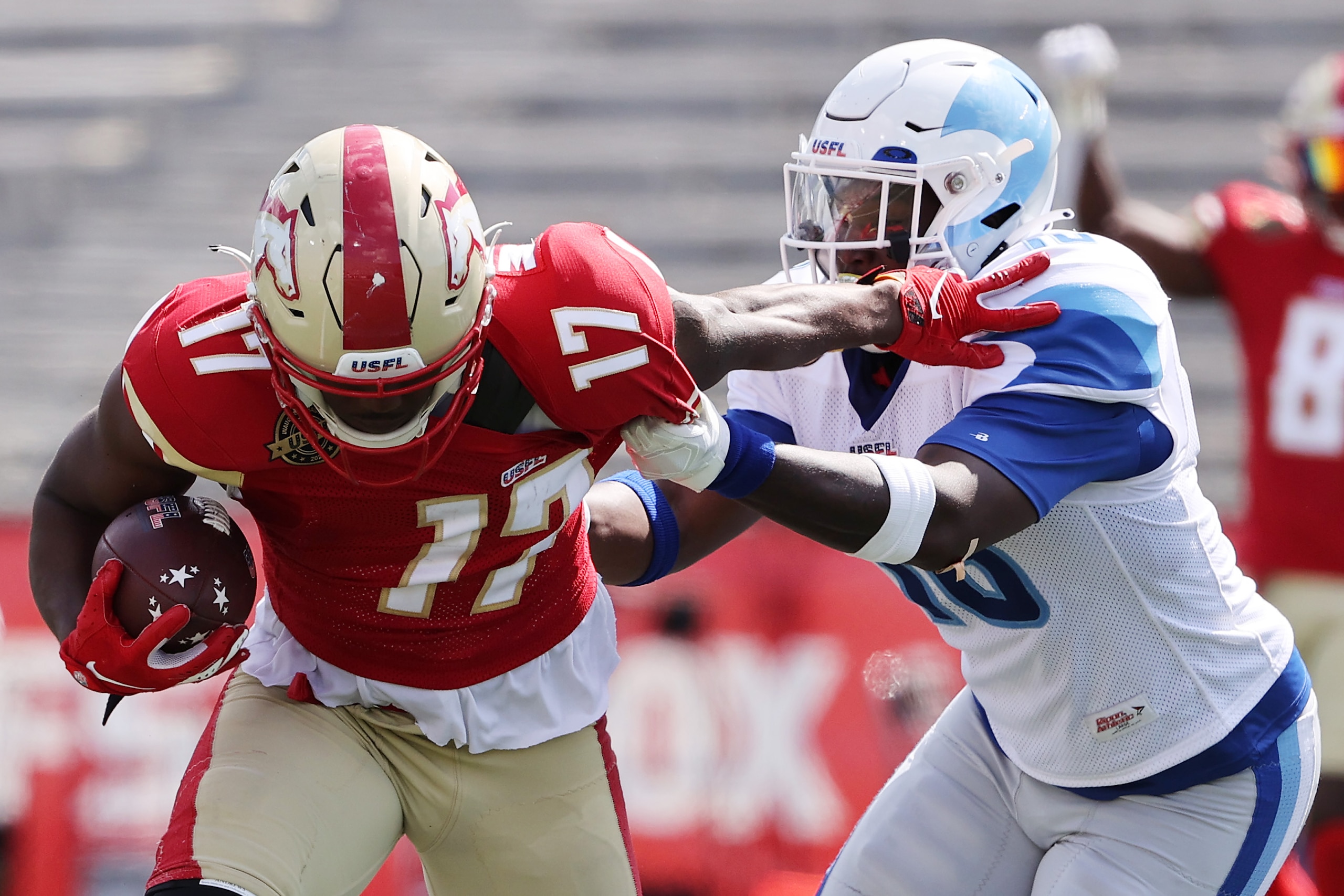 BIRMINGHAM, ALABAMA - JUNE 04: Marlon Williams #17 of the Birmingham Stallions is tackled by Aashari Crosswell #16 of the New Orleans Breakers in the fourth quarter of the game at Legion Field on June 04, 2022 in Birmingham, Alabama. (Photo by Buda Mendes/USFL/Getty Images)