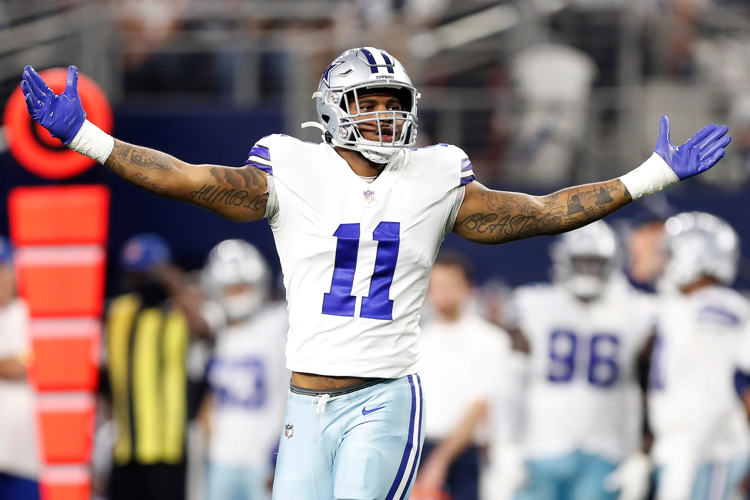 ARLINGTON, TEXAS - DECEMBER 26: Micah Parsons #11 of the Dallas Cowboys celebrates after a sack during the second half against the Washington Football Team at AT&T Stadium on December 26, 2021 in Arlington, Texas. (Photo by Wesley Hitt/Getty Images)