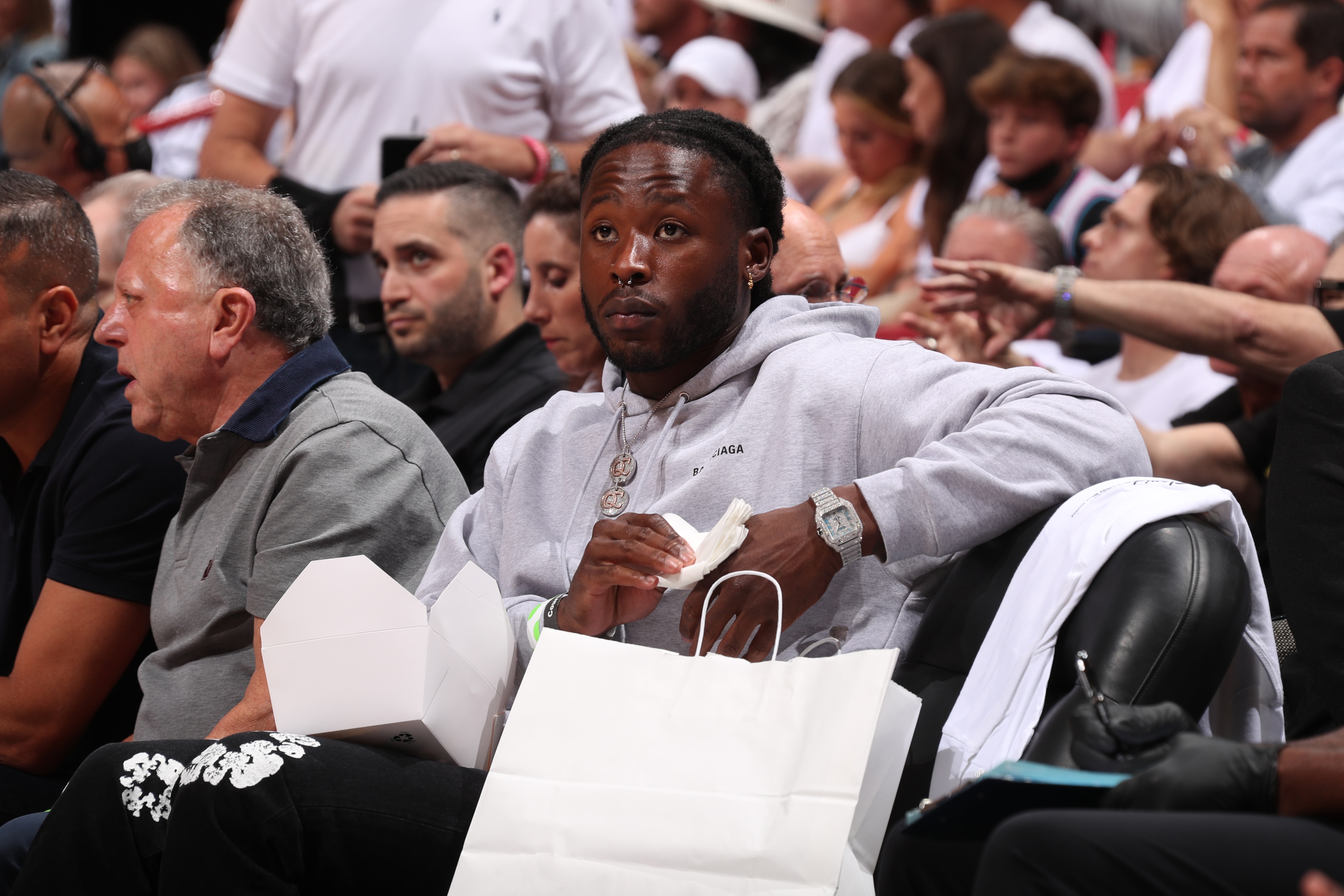 MIAMI, FL - APRIL 19: Alvin Kamara of the New Orleans Saints attends a game between the Atlanta Hawks and Miami Heat during Round 1 Game 2 of the 2022 NBA Playoffs on April 19, 2022 at FTX Arena in Miami, Florida. NOTE TO USER: User expressly acknowledges and agrees that, by downloading and or using this Photograph, user is consenting to the terms and conditions of the Getty Images License Agreement. Mandatory Copyright Notice: Copyright 2022 NBAE (Photo by Issac Baldizon/NBAE via Getty Images)