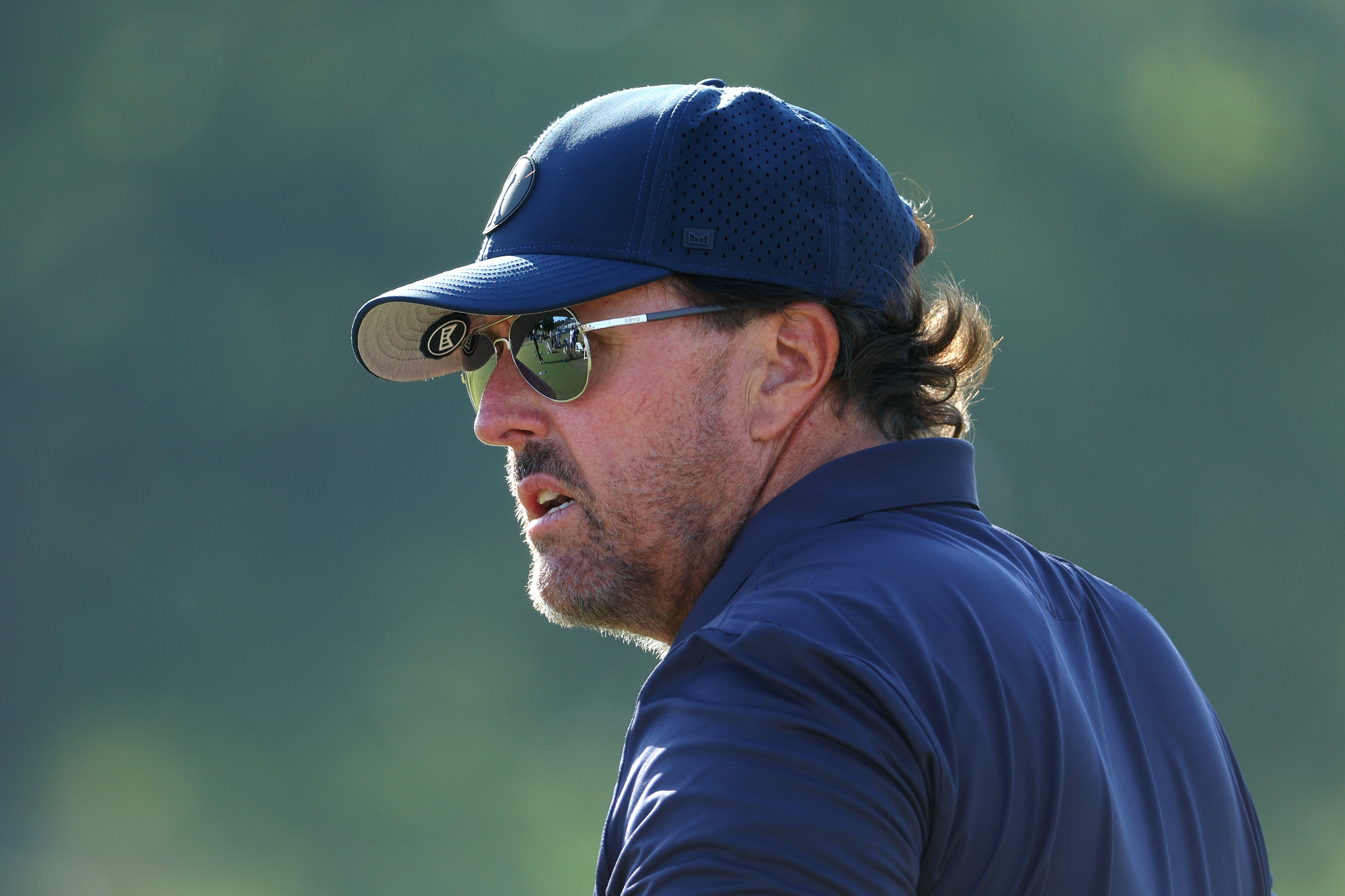 BROOKLINE, MASSACHUSETTS - JUNE 17: Phil Mickelson of the United States looks on from the driving range during the second round of the 122nd U.S. Open Championship at The Country Club on June 17, 2022 in Brookline, Massachusetts. (Photo by Andrew Redington/Getty Images)