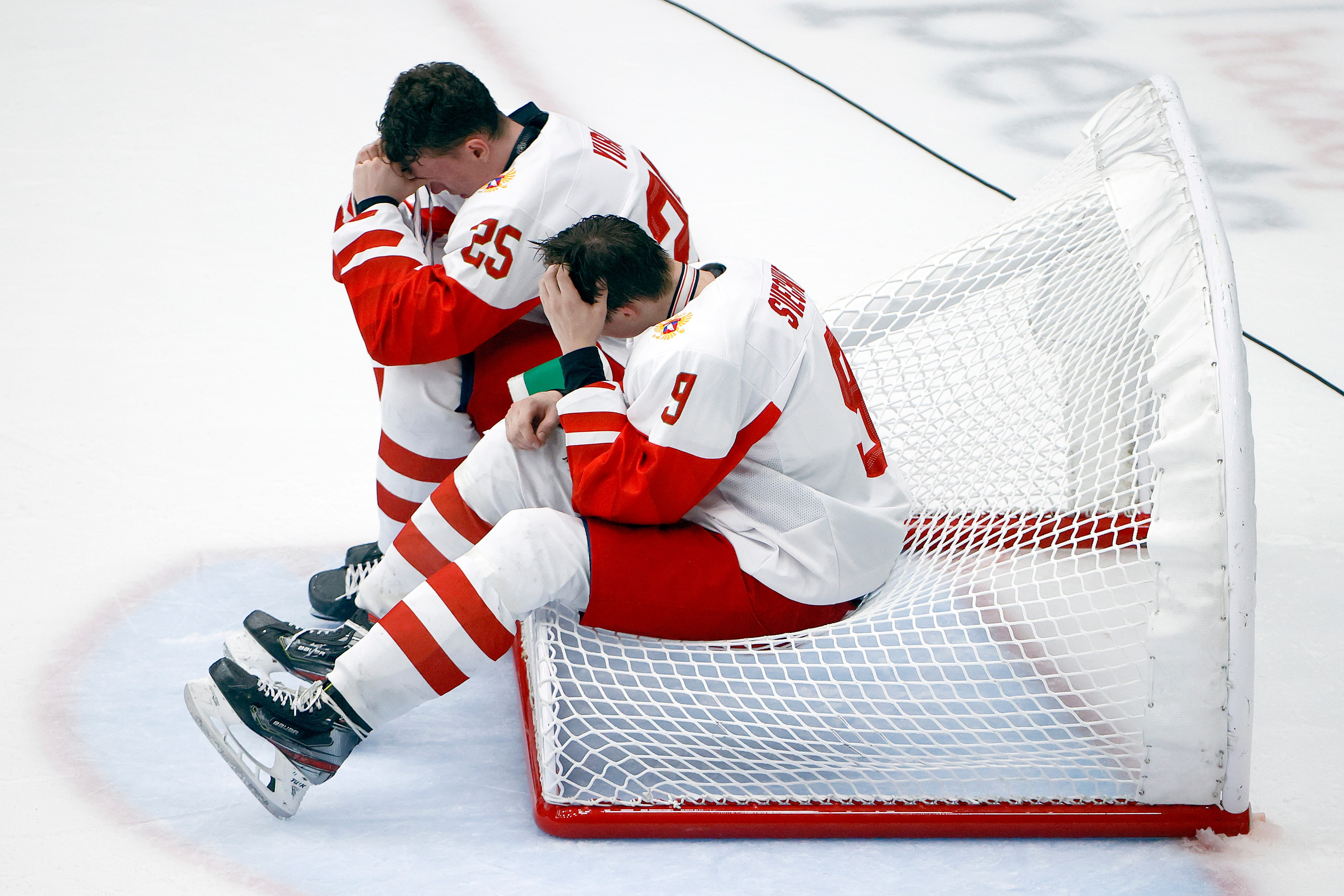 FRISCO, TEXAS - MAY 06: Danila Yurov #25 of Russia and Fyodor Svechkov #9 of Russia react after losing 3-5 to Canada in the 2021 IIHF Ice Hockey U18 World Championship Gold Medal Game at Comerica Center on May 06, 2021 in Frisco, Texas. (Photo by Tom Pennington/Getty Images)