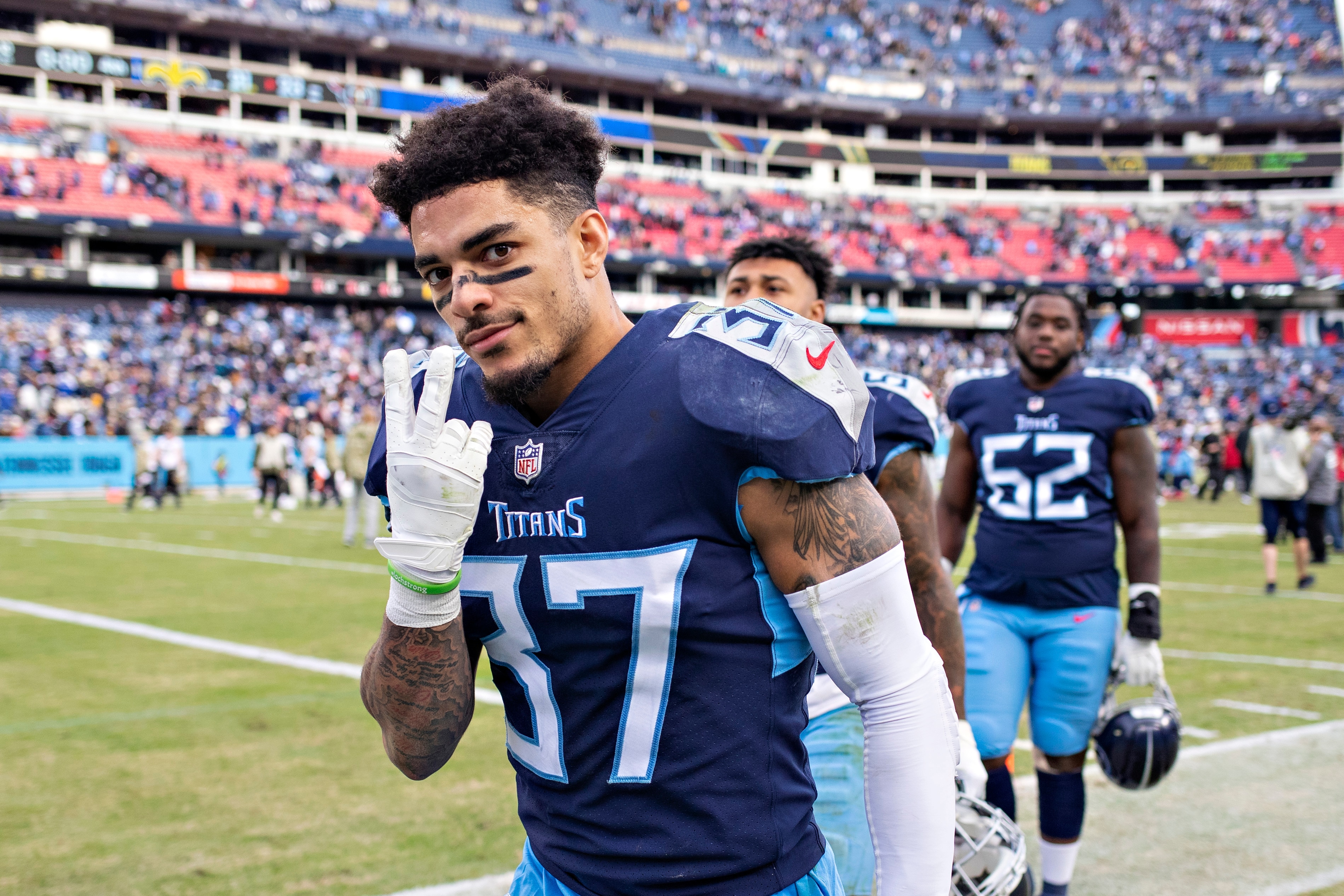NASHVILLE, TENNESSEE - NOVEMBER 14:  Amani Hooker #37 of the Tennessee Titans signals to the camera after a game against the New Orleans Saints at Nissan Stadium on November 14, 2021 in Nashville, Tennessee.  The Titans defeated the Saints 23-21.  (Photo by Wesley Hitt/Getty Images)