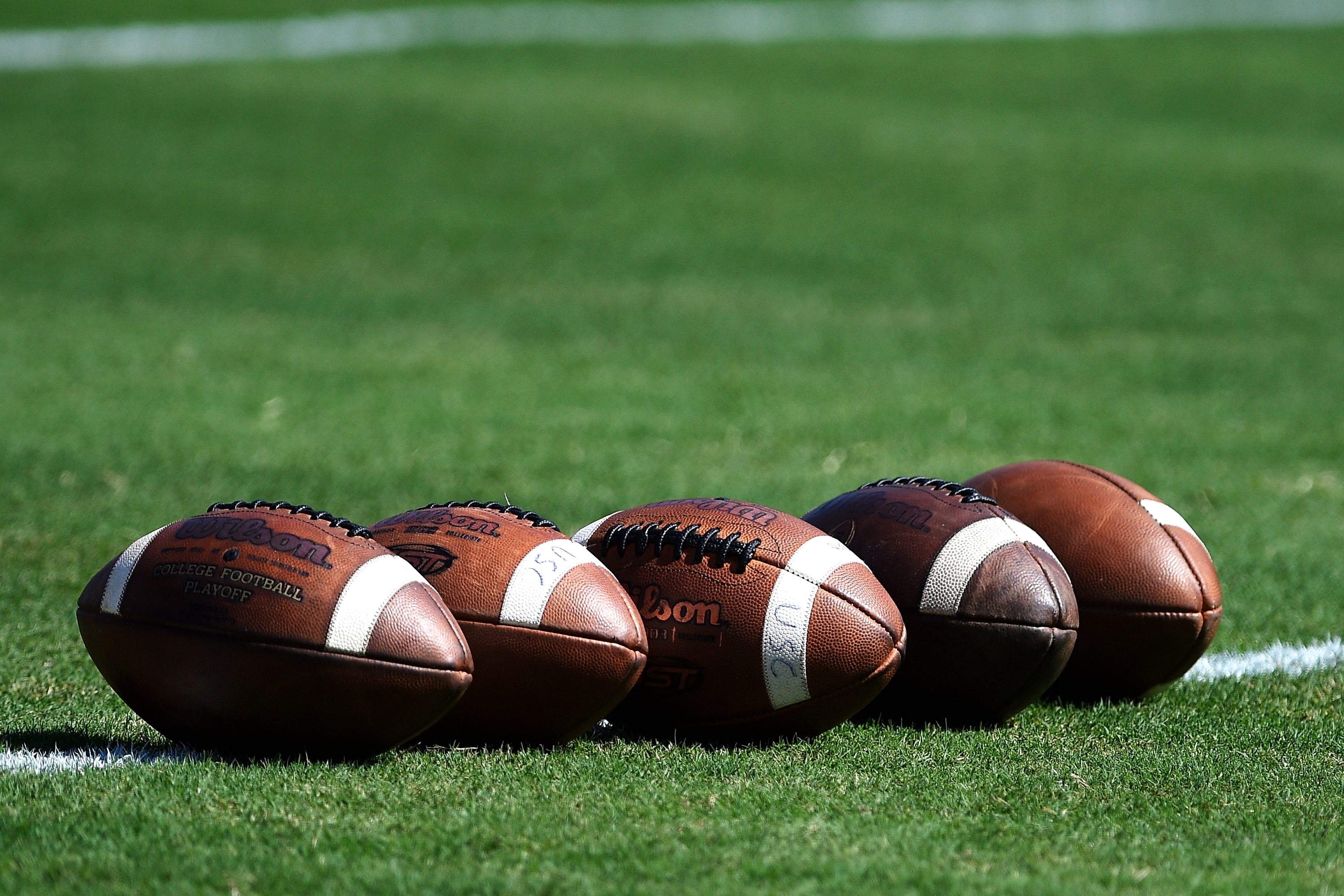 COLUMBIA, SC - SEPTEMBER 01: Wilson footballs are lined up on the field prior to the game between the Coastal Carolina Chanticleers and the South Carolina Gamecocks at Williams-Brice Stadium on September 1, 2018 in Columbia, South Carolina. SC won 49-15. (Photo by Lance King/Getty Images)