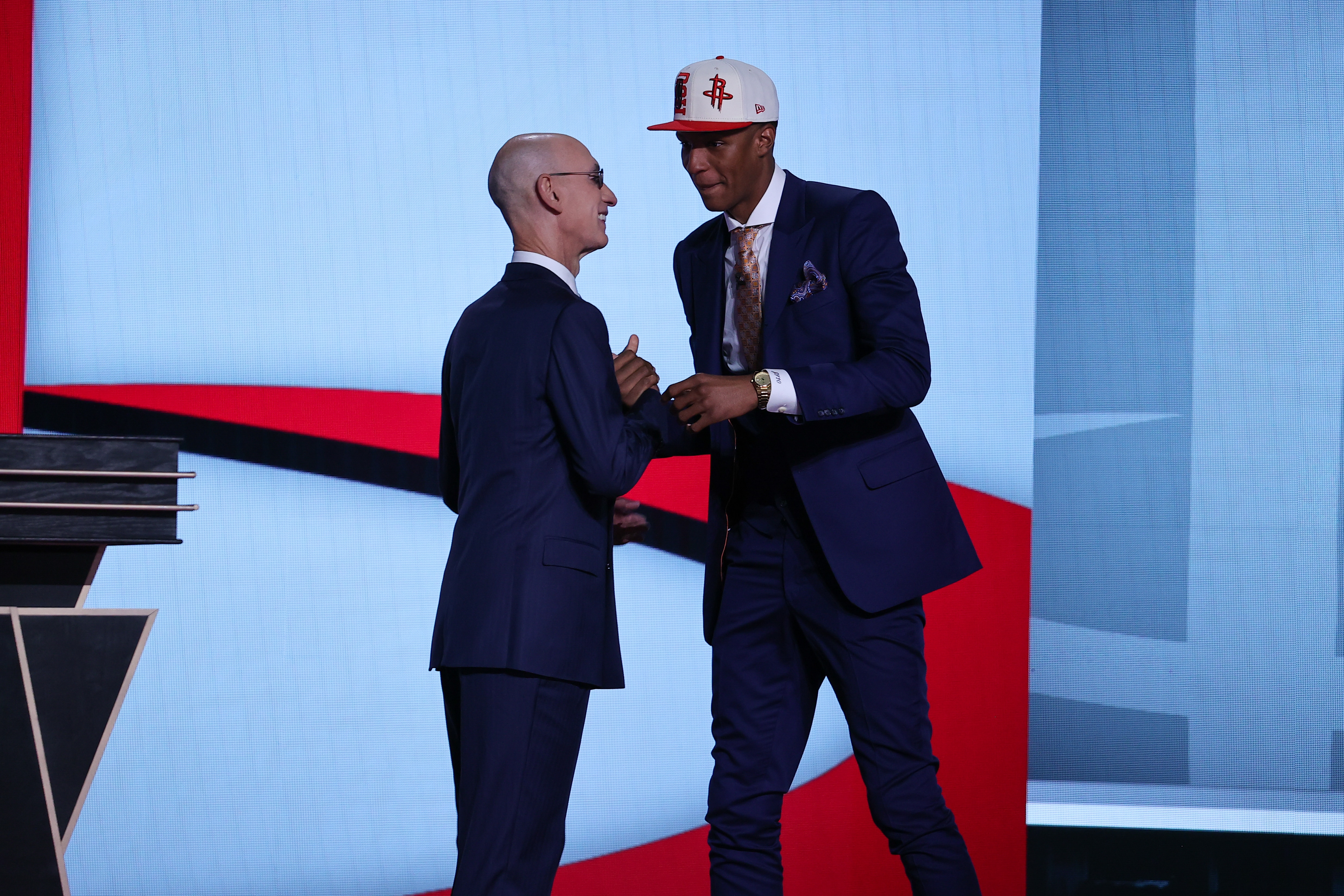 NEW YORK, NY, USA - JUNE 23: Jabari Smith Jr. shakes hands with NBA Commissioner, Adam Silver (L) after being selected number three overall by the Houston Rockets during the 2022 NBA Draft on June 23, 2022 at Barclays Center in Brooklyn, New York, United States. (Photo by Tayfun Coskun/Anadolu Agency via Getty Images)