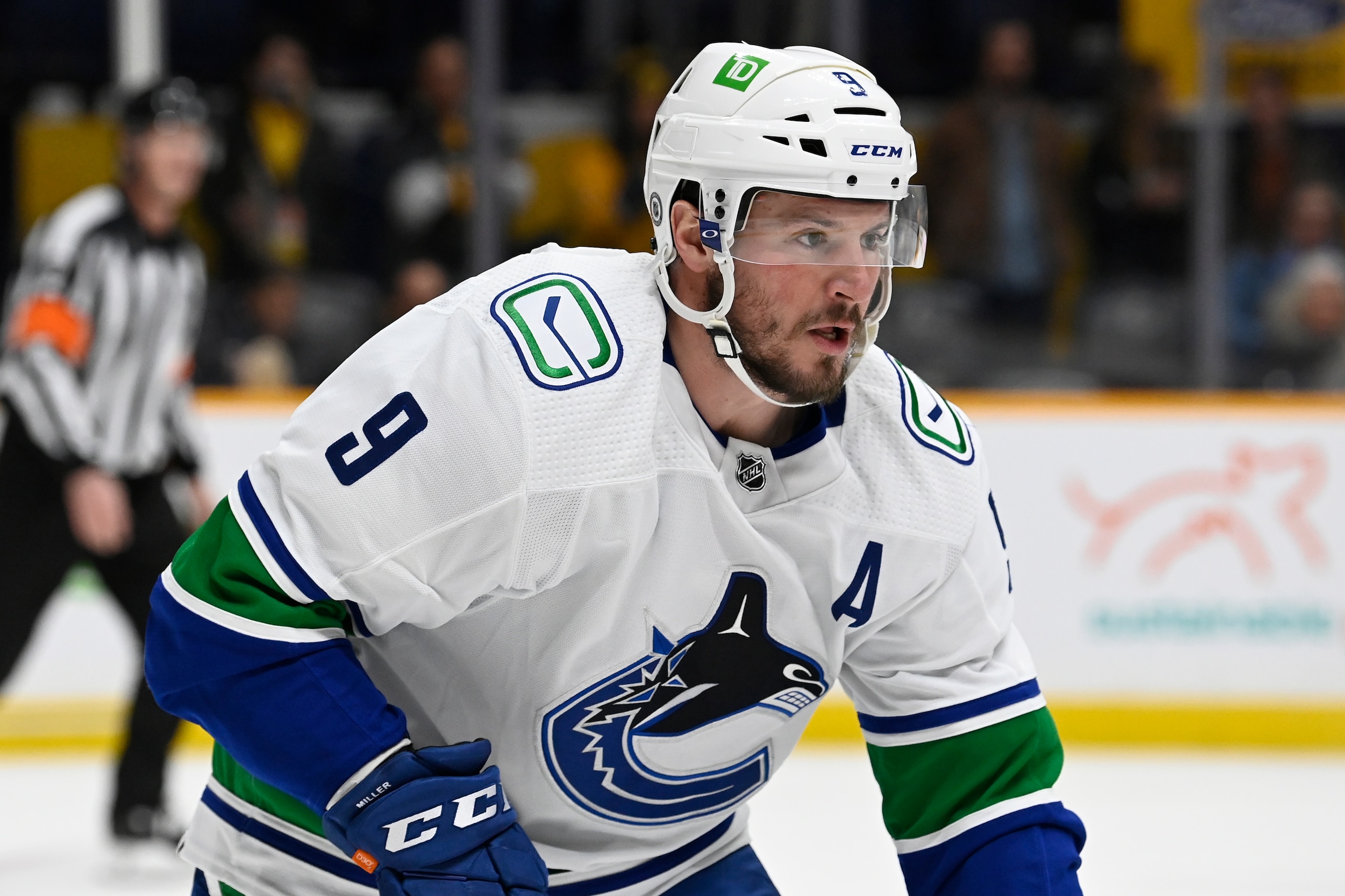 Vancouver Canucks center J.T. Miller (9) plays against the Nashville Predators during the first period of an NHL hockey game Tuesday, Feb. 1, 2022, in Nashville, Tenn. (AP Photo/Mark Zaleski)