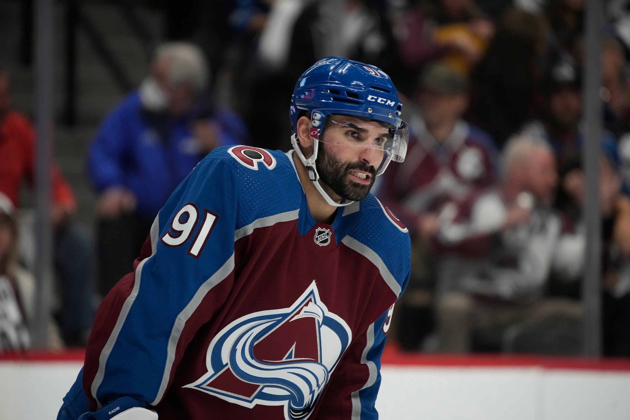 Colorado Avalanche center Nazem Kadri waits for a faceoff during the second period of Game 5 of the team's NHL hockey Stanley Cup second-round playoff series against the St. Louis Blues on Wednesday, May 25, 2022, in Denver. (AP Photo/David Zalubowski)