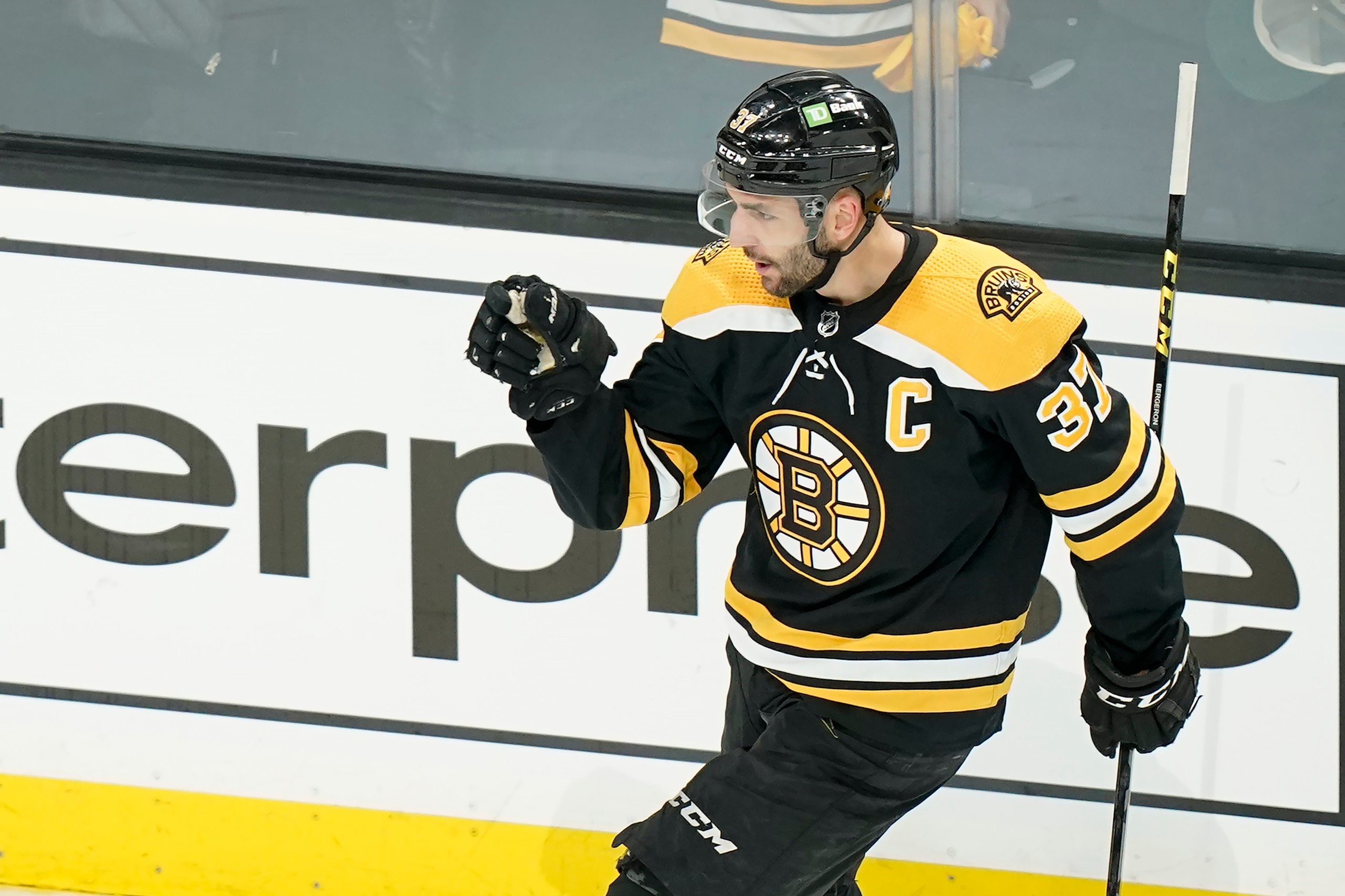 Boston Bruins' Patrice Bergeron (37) celebrates after scoring in the first period of Game 4 of an NHL hockey Stanley Cup first-round playoff series against the Carolina Hurricanes, Sunday, May 8, 2022, in Boston. (AP Photo/Steven Senne) Boston Bruins' Patrice Bergeron (37) celebrates after scoring in the first period of Game 4 of an NHL hockey Stanley Cup first-round playoff series against the Carolina Hurricanes, Sunday, May 8, 2022, in Boston. (AP Photo/Steven Senne)