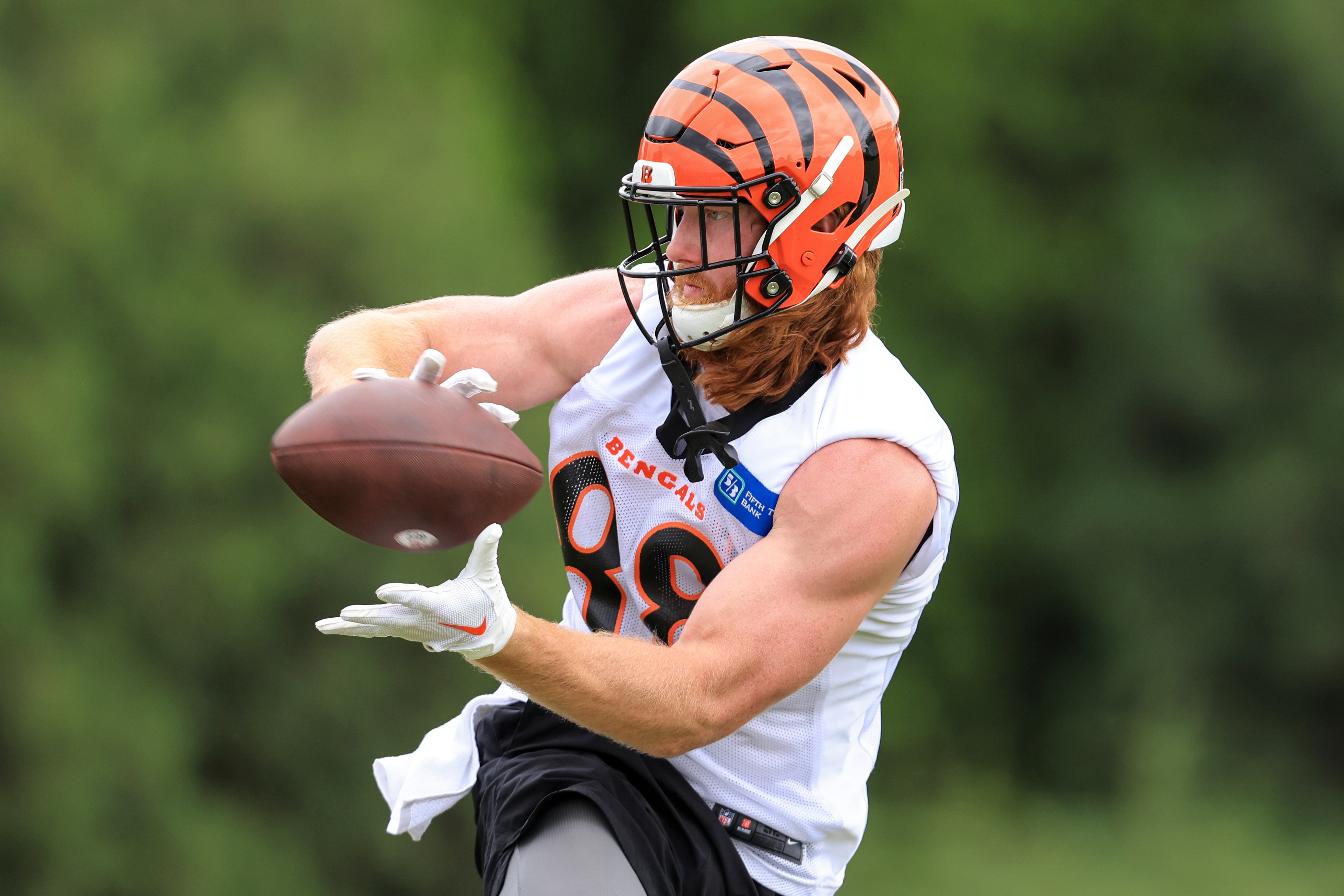 Cincinnati Bengals' Hayden Hurst makes a catch as he participates in a drill during an NFL football practice in Cincinnati, Tuesday, June 7, 2022. (AP Photo/Aaron Doster)