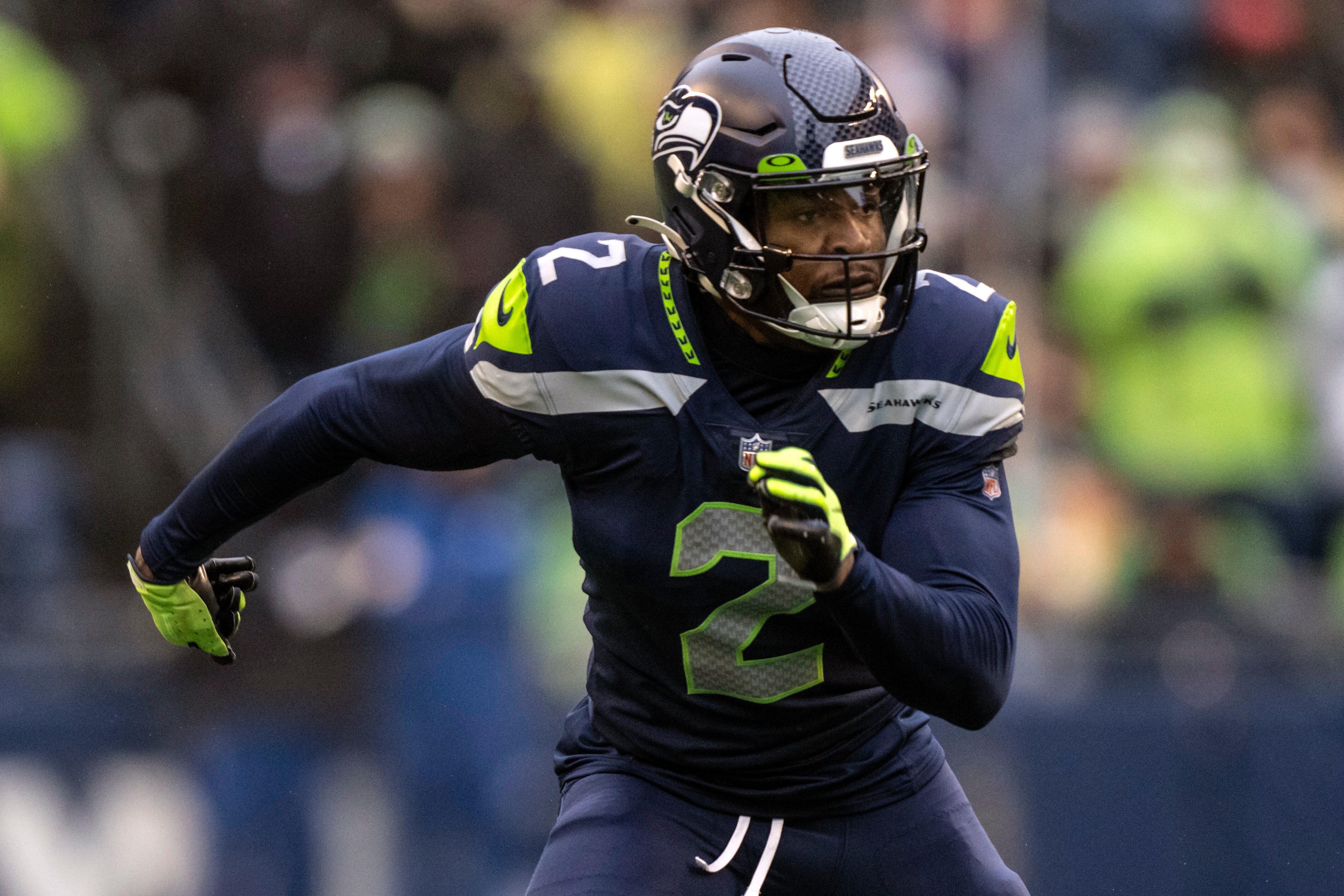 FILE - Seattle Seahawks defensive back D.J. Reed chases a play during an NFL football game against the Detroit Lions, on Jan. 2, 2022, in Seattle. The New York Jets are signing former Seahawks cornerback D.J. Reed, according to a person with direct knowledge of the move. The person confirmed the agreement to The Associated Press on condition of anonymity on Tuesday, March 15, 2022, because the team had not announced it; deals are not made official until the NFL's league year begins Wednesday. (AP Photo/Stephen Brashear, File)