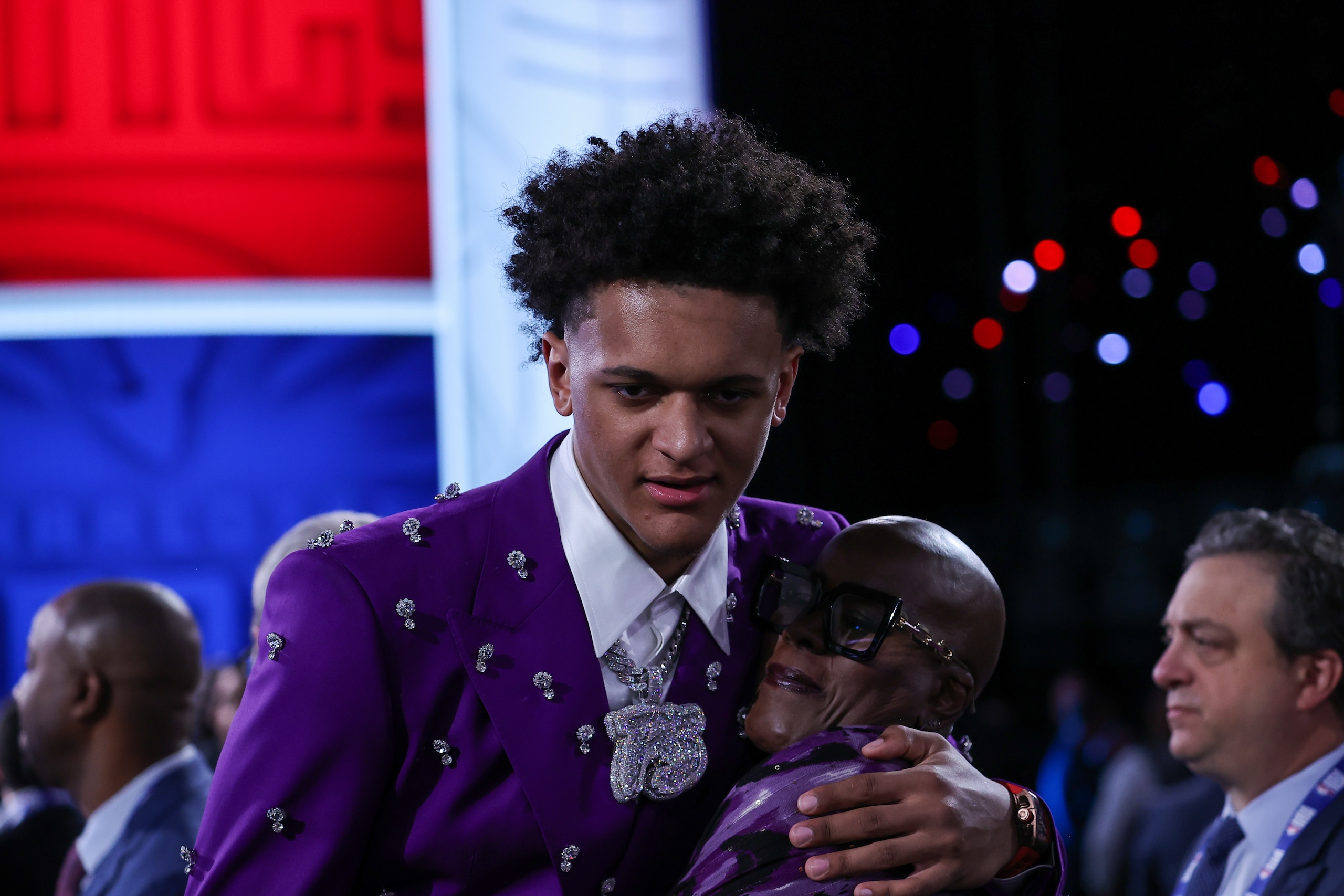 NEW YORK, NY, USA - JUNE 23: Paolo Banchero (L) hugs with his a family member after being selected number one overall by the Orlando Magic during the 2022 NBA Draft on June 23, 2022 at Barclays Center in Brooklyn, New York, United States. (Photo by Tayfun Coskun/Anadolu Agency via Getty Images)