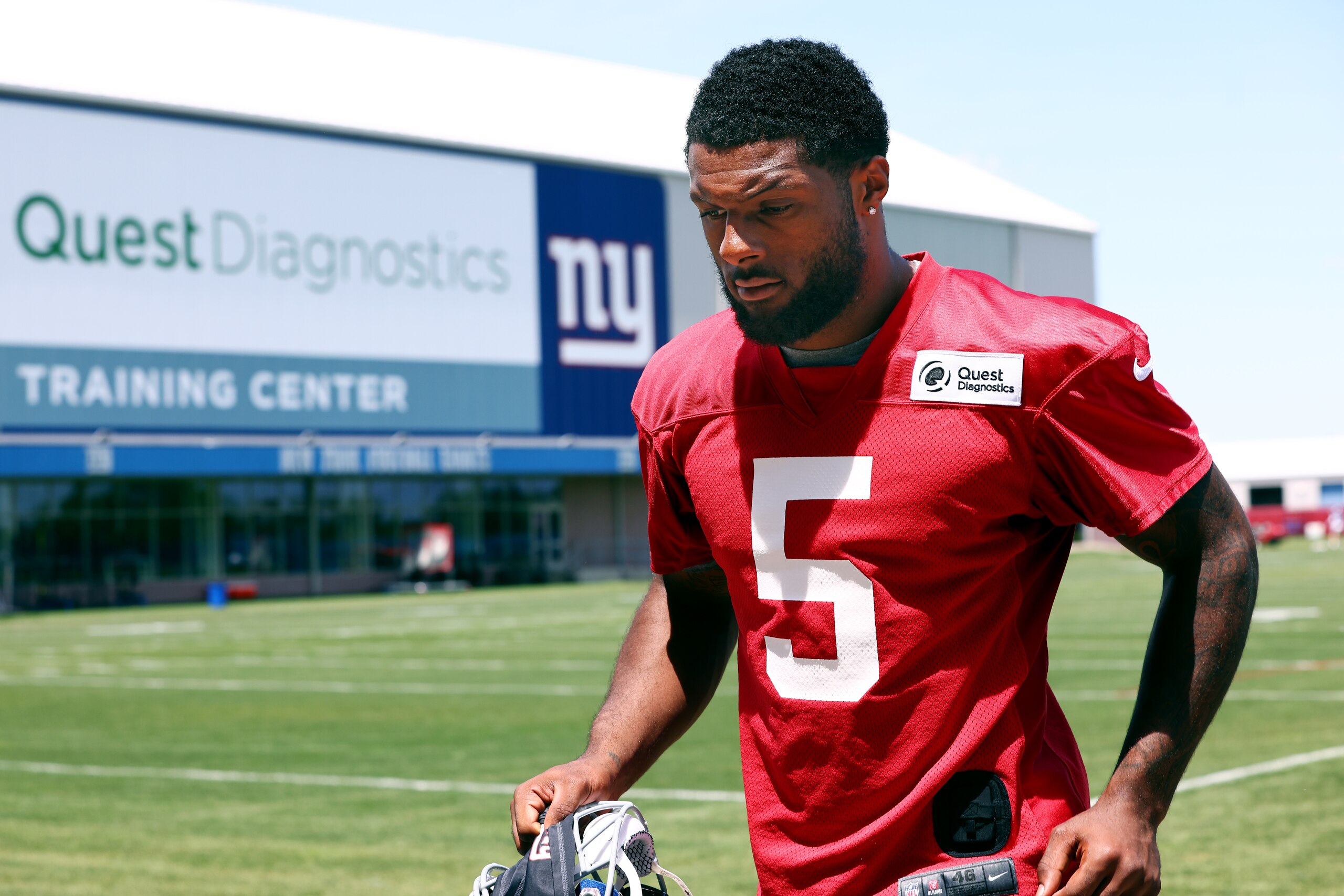 EAST RUTHERFORD, NJ - JUNE 08: Linebacker Kayvon Thibodeaux #5 of the New York Giants walks off the field after the teams mandatory minicamp at Quest Diagnostics Training Center on June 8, 2022 in East Rutherford, New Jersey. (Photo by Rich Schultz/Getty Images)