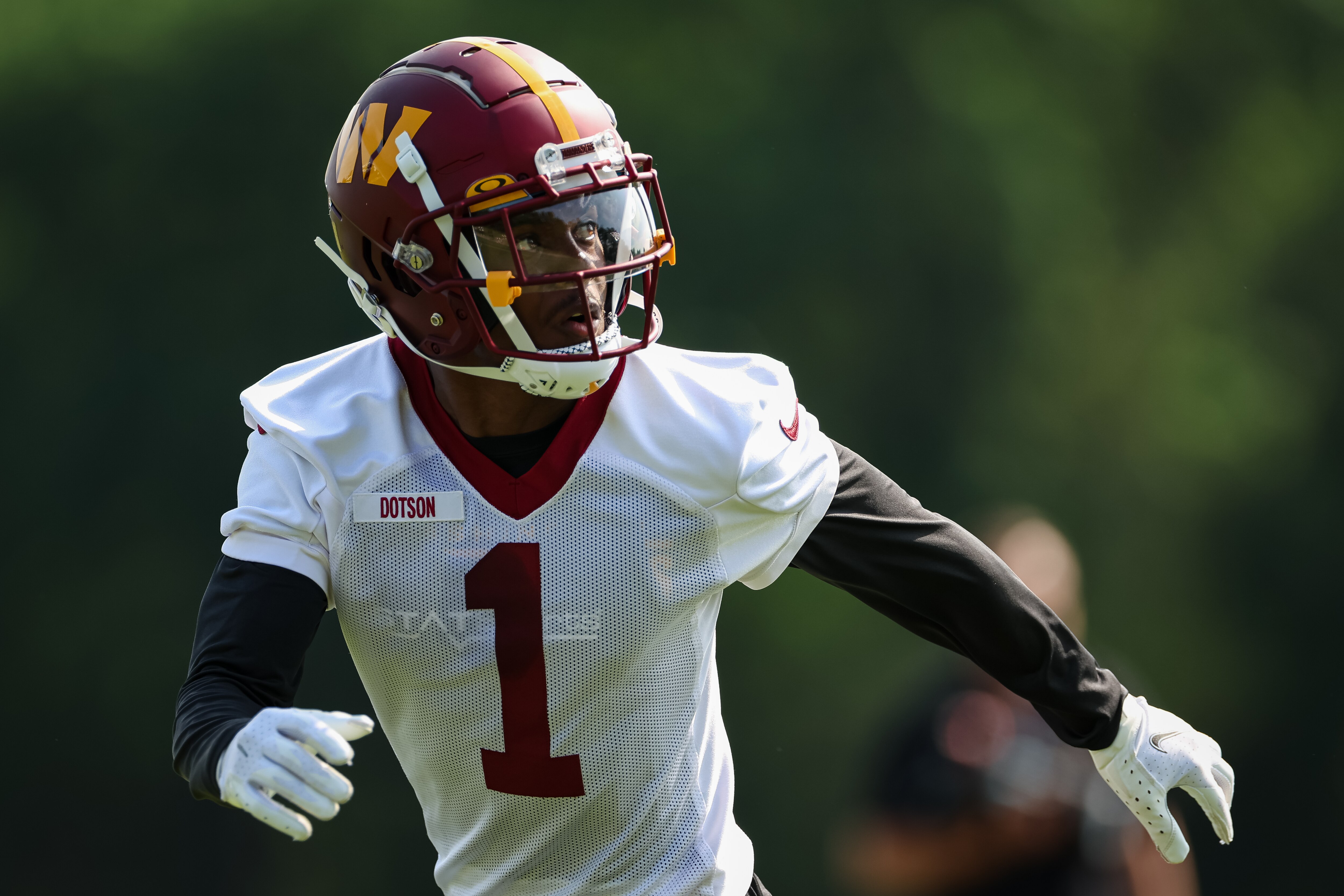 ASHBURN, VA - JUNE 16: Jahan Dotson #1 of the Washington Commanders participates in a drill during the organized team activity at INOVA Sports Performance Center on June 16, 2022 in Ashburn, Virginia. (Photo by Scott Taetsch/Getty Images)
