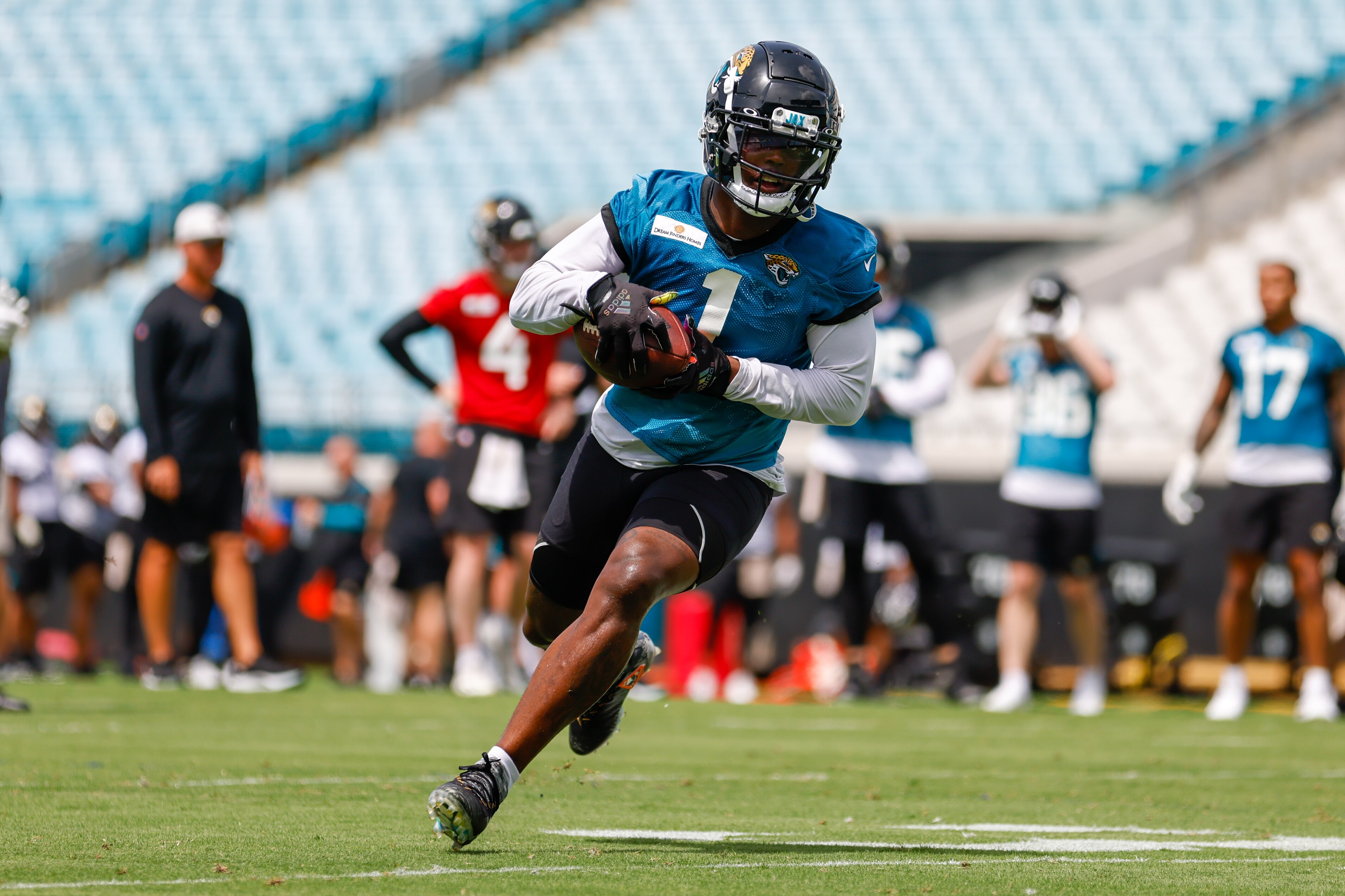 JACKSONVILLE, FL - MAY 23: Jacksonville Jaguars Running Back Travis Etienne Jr. (1) during Jacksonville Jaguars OTA Offseason Workouts on May 23, 2022 at TIAA Bank Field in Jacksonville, Fl. (Photo by David Rosenblum/Icon Sportswire via Getty Images)