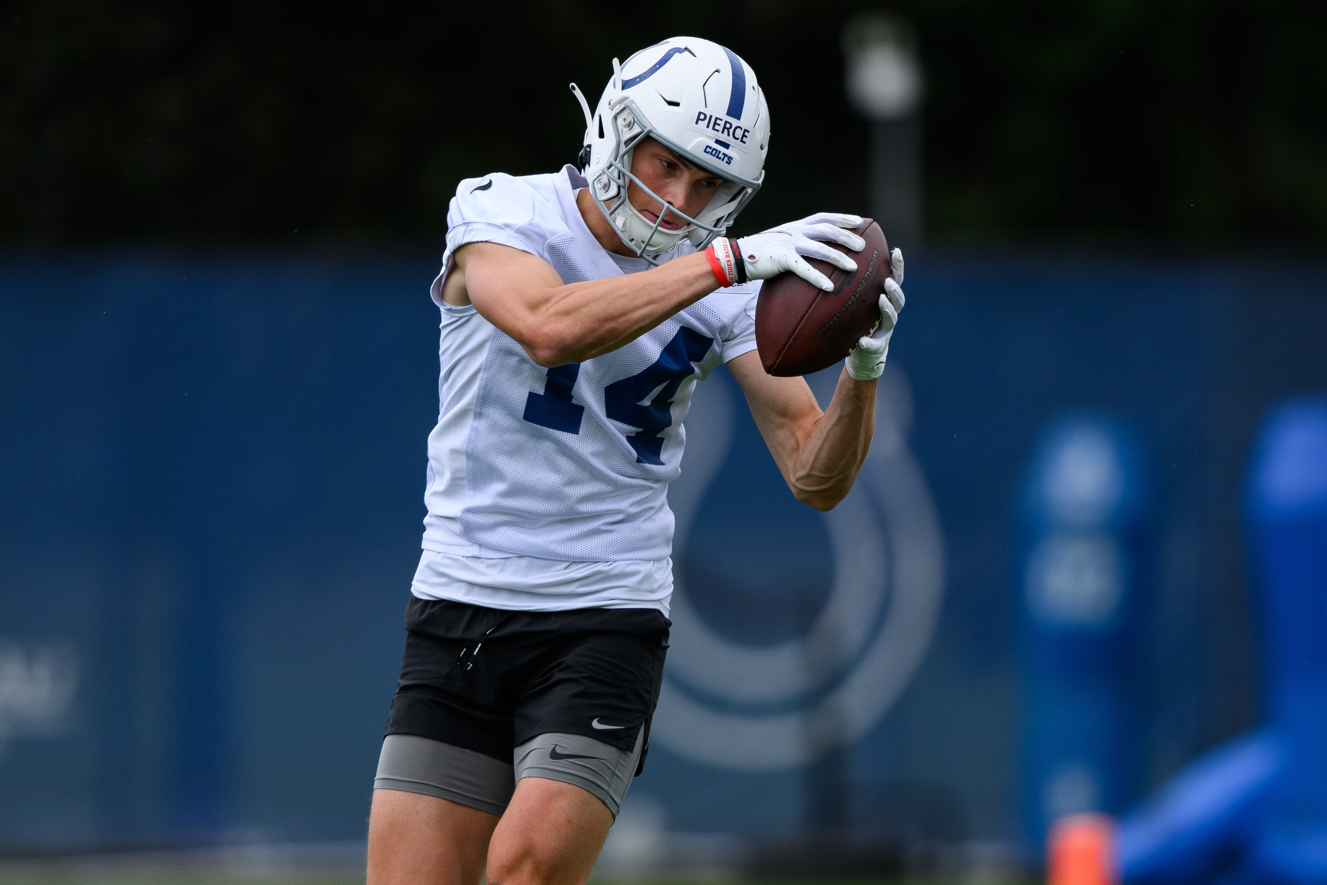 INDIANAPOLIS, IN - JUNE 08: Indianapolis Colts wide receiver Alec Pierce (14) runs through a drill during the Indianapolis Colts OTA offseason workouts on June 8, 2022 at the Indiana Farm Bureau Football Center in Indianapolis, IN. (Photo by Zach Bolinger/Icon Sportswire via Getty Images)
