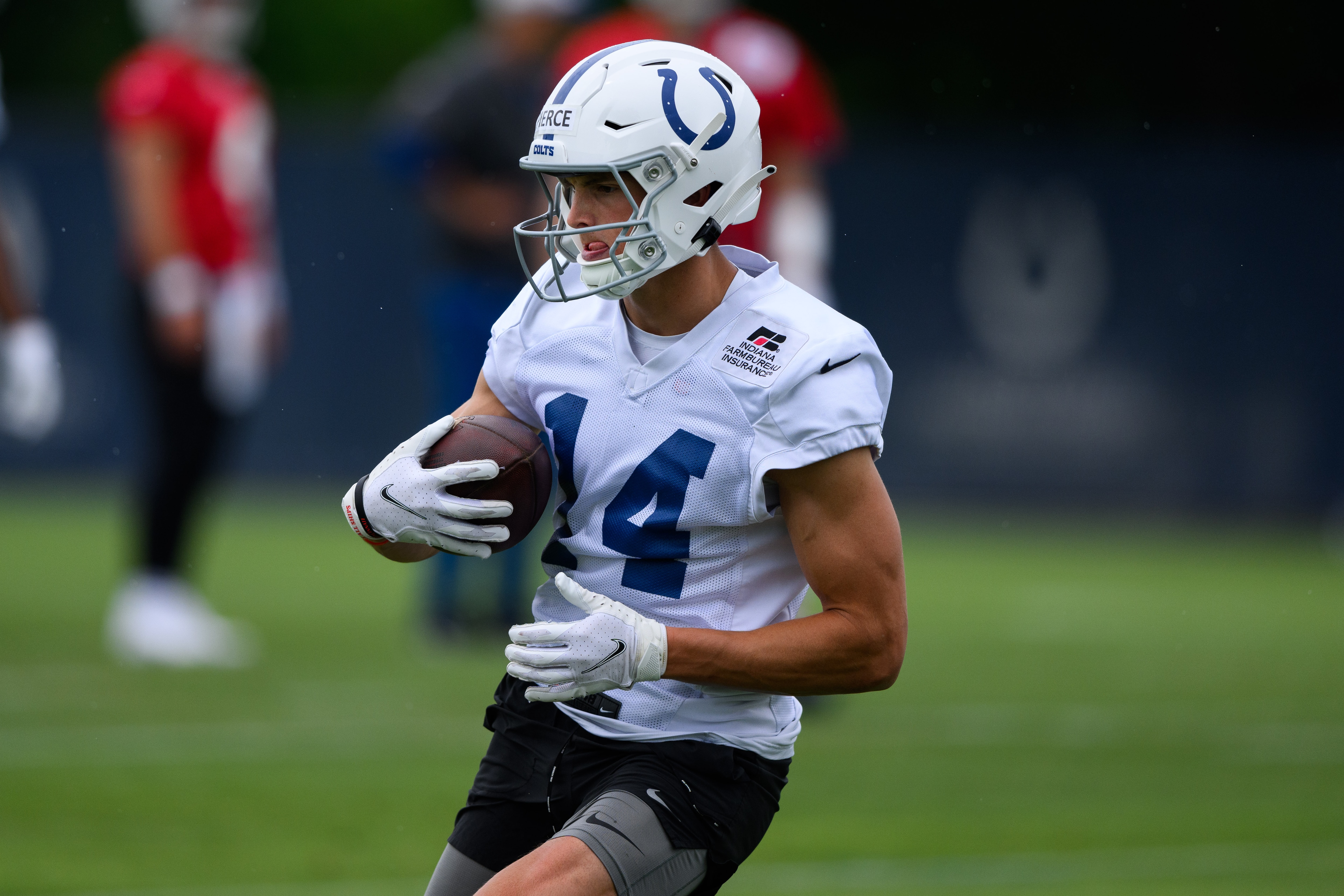 INDIANAPOLIS, IN - JUNE 08: Indianapolis Colts wide receiver Alec Pierce (14) runs through a drill during the Indianapolis Colts OTA offseason workouts on June 8, 2022 at the Indiana Farm Bureau Football Center in Indianapolis, IN. (Photo by Zach Bolinger/Icon Sportswire via Getty Images)