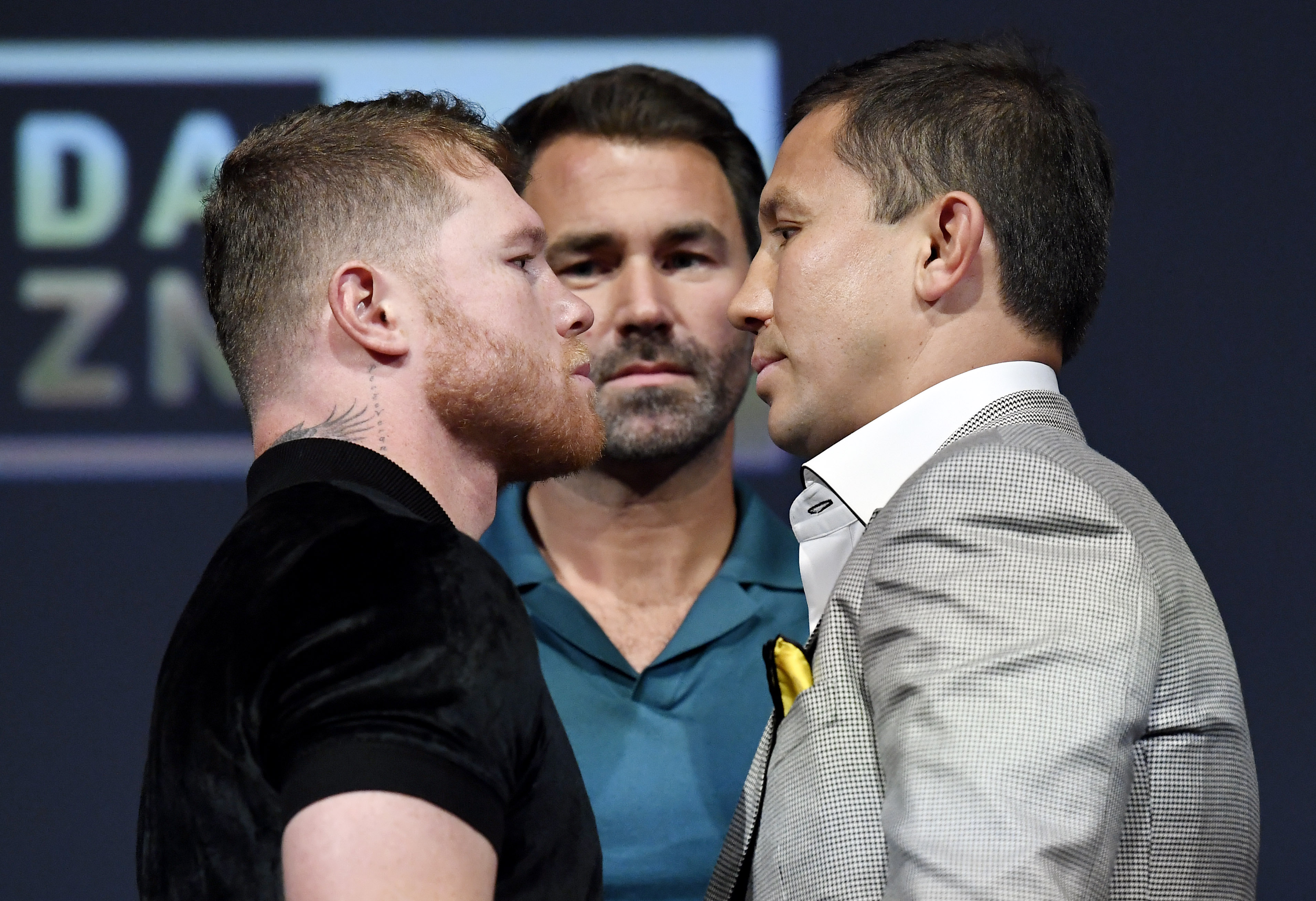 HOLLYWOOD, CA - JUNE 24: Boxer Canelo Alvarez (L) and Gennady Golovkin (R) pose, with boxing promotor Eddie Hearn during a news conference on June 24, 2022 in Hollywood, California. Alvarez and Golovkin will meet in a Las Vegas, Nevada on September 17, 2022, for the undisputed super middleweight championship of the world.  (Photo by Kevork Djansezian/Getty Images)