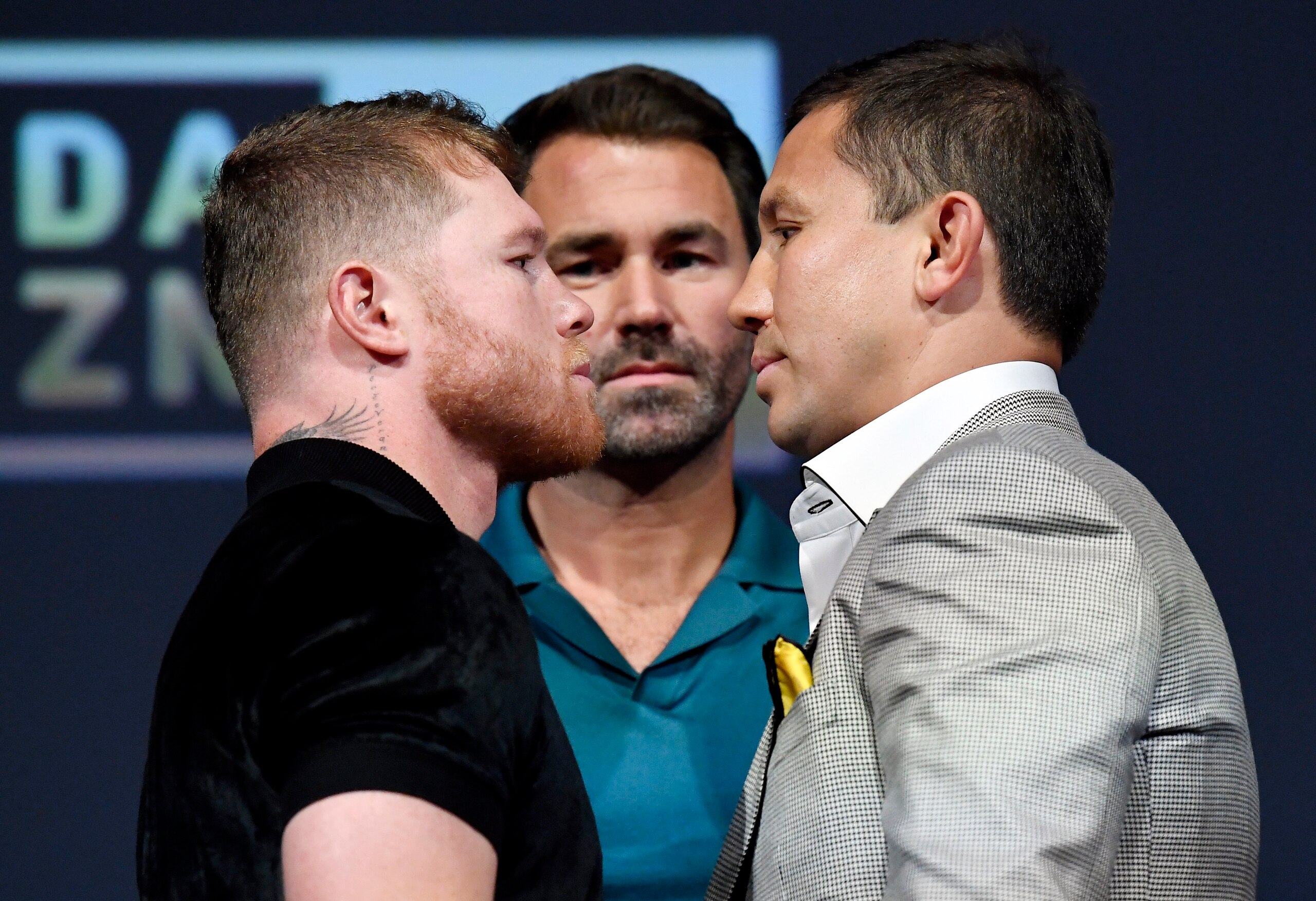 HOLLYWOOD, CA - JUNE 24: Boxer Canelo Alvarez (L) and Gennady Golovkin (R) pose, with boxing promotor Eddie Hearn during a news conference on June 24, 2022 in Hollywood, California. Alvarez and Golovkin will meet in a Las Vegas, Nevada on September 17, 2022, for the undisputed super middleweight championship of the world.  (Photo by Kevork Djansezian/Getty Images)