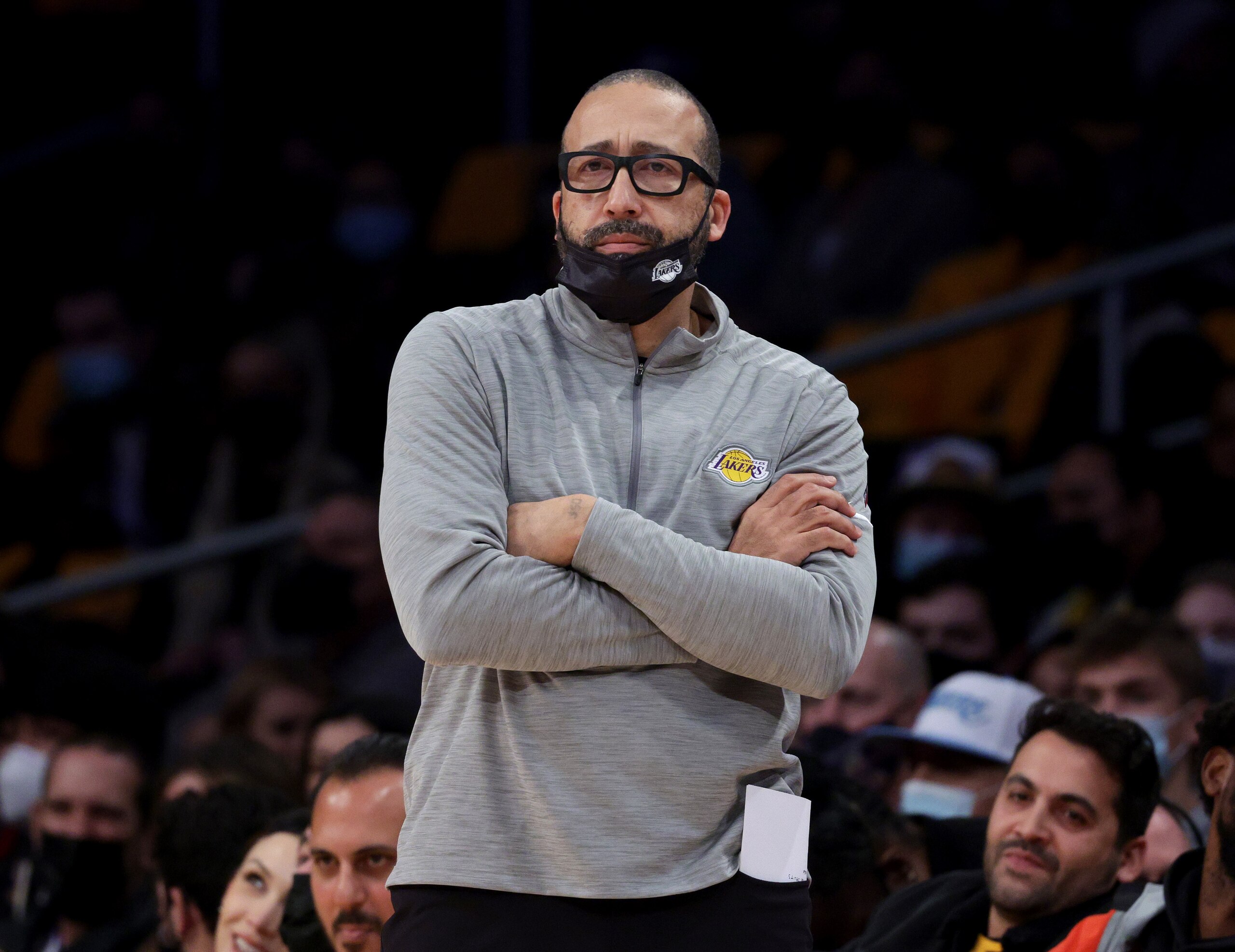 LOS ANGELES, CALIFORNIA - DECEMBER 23: Assistant head coach David Fizdale watches play from the sidelines during a 138-110 San Antonio Spurs win at Staples Center on December 23, 2021 in Los Angeles, California. NOTE TO USER: User expressly acknowledges and agrees that, by downloading and/or using this Photograph, user is consenting to the terms and conditions of the Getty Images License Agreement. Mandatory Copyright Notice: Copyright 2021 NBAE (Photo by Harry How/Getty Images)