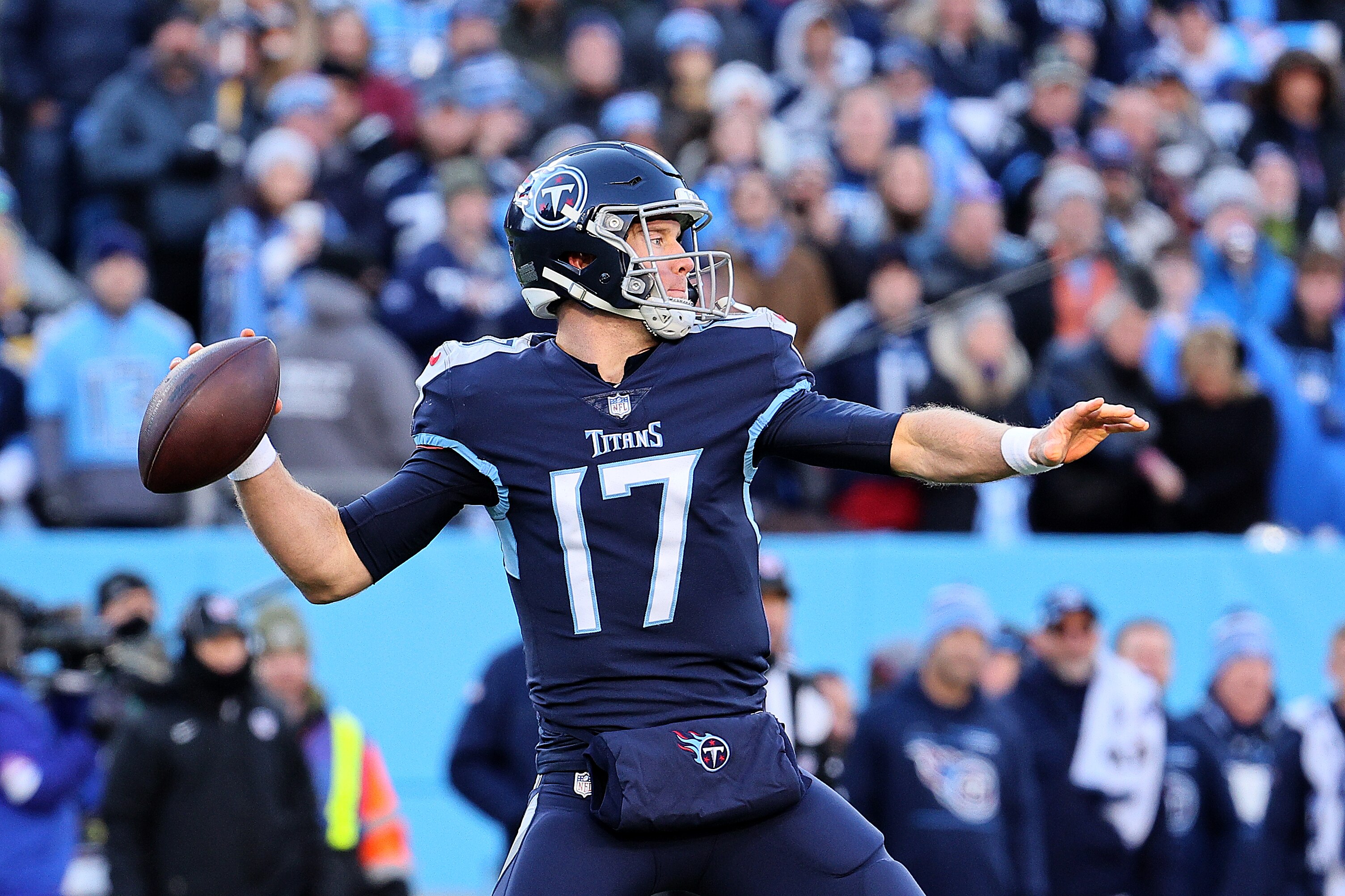 NASHVILLE, TENNESSEE - JANUARY 22: Quarterback Ryan Tannehill #17 of the Tennessee Titans throws a first quarter pass against the Cincinnati Bengals in the AFC Divisional Playoff game at Nissan Stadium on January 22, 2022 in Nashville, Tennessee. (Photo by Andy Lyons/Getty Images)