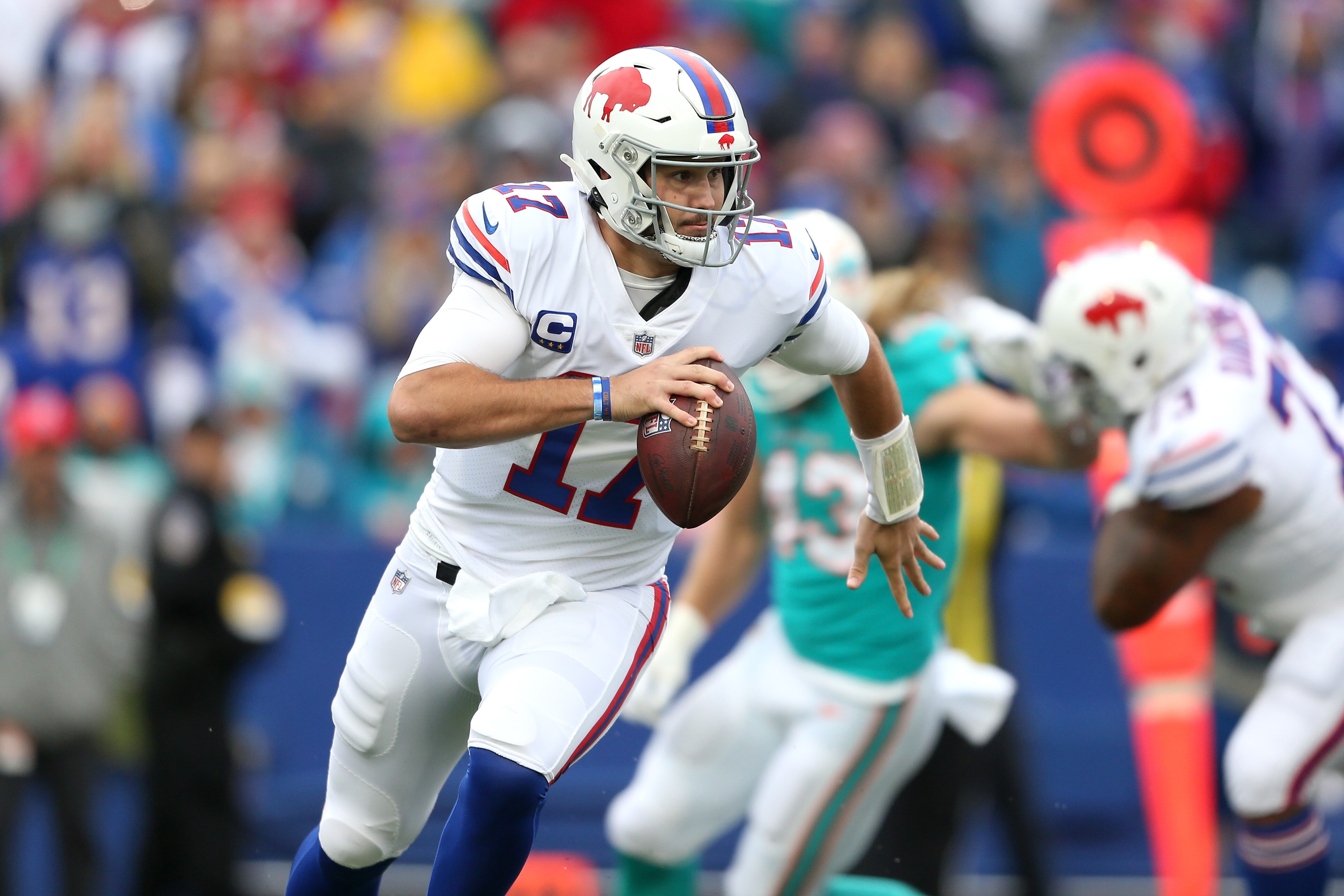 ORCHARD PARK, NEW YORK - OCTOBER 31: Josh Allen #17 of the Buffalo Bills drops back to pass in the first quarter against the Miami Dolphins at Highmark Stadium on October 31, 2021 in Orchard Park, New York. (Photo by Joshua Bessex/Getty Images)