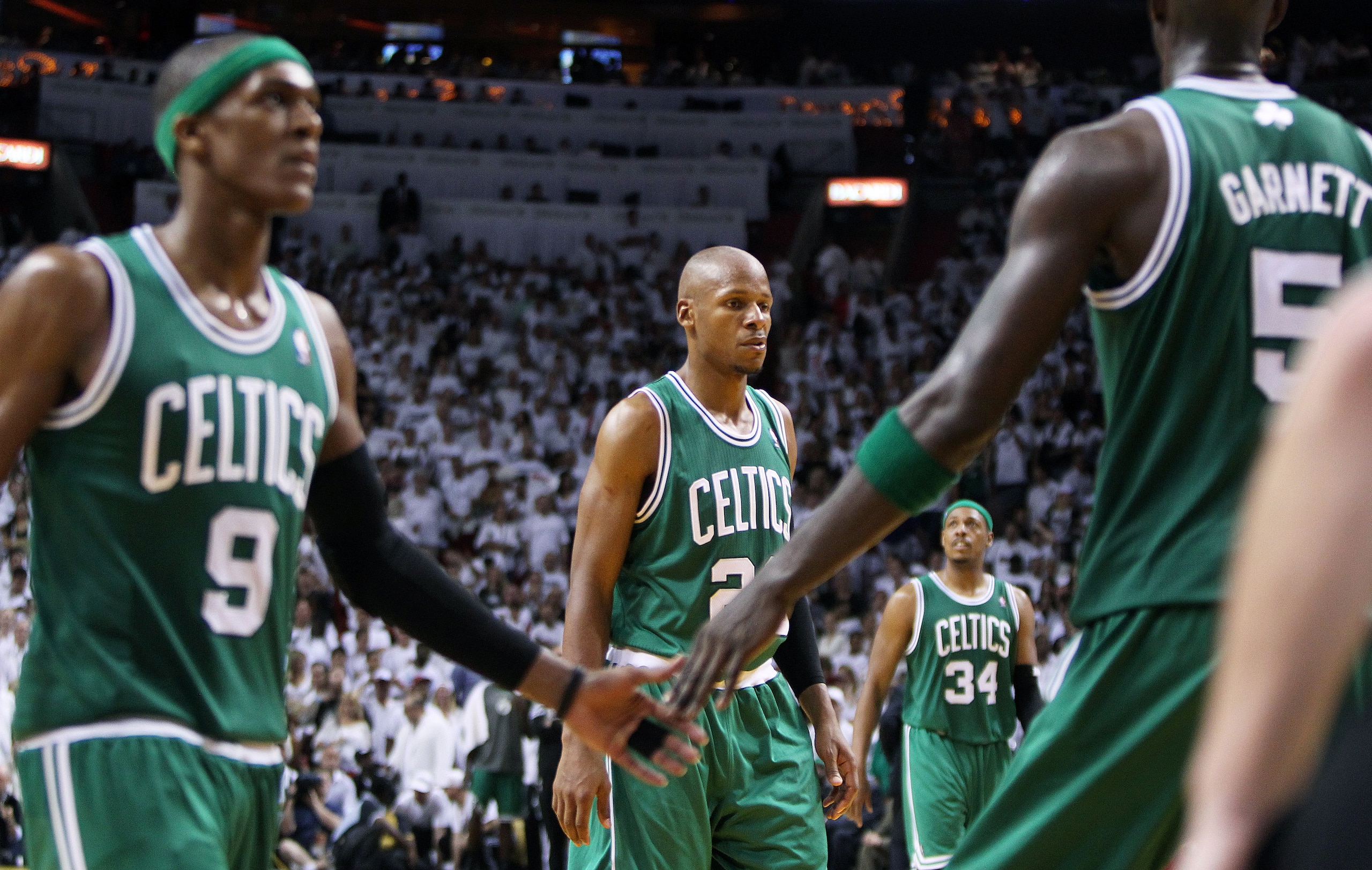 MIAMI, FL - JUNE 9: The Celtics Rajon Rondo, Ray Allen, Paul Pierce and Kevin Garnett late in the game, when the outcome was no longer in doubt. The Boston Celtics visited the Miami Heat for game seven of the NBA Eastern Conference Finals at the American Airlines Arena. (Photo by Jim Davis/The Boston Globe via Getty Images) MIAMI, FL - JUNE 9: The Celtics Rajon Rondo, Ray Allen, Paul Pierce and Kevin Garnett late in the game, when the outcome was no longer in doubt. The Boston Celtics visited the Miami Heat for game seven of the NBA Eastern Conference Finals at the American Airlines Arena. (Photo by Jim Davis/The Boston Globe via Getty Images)