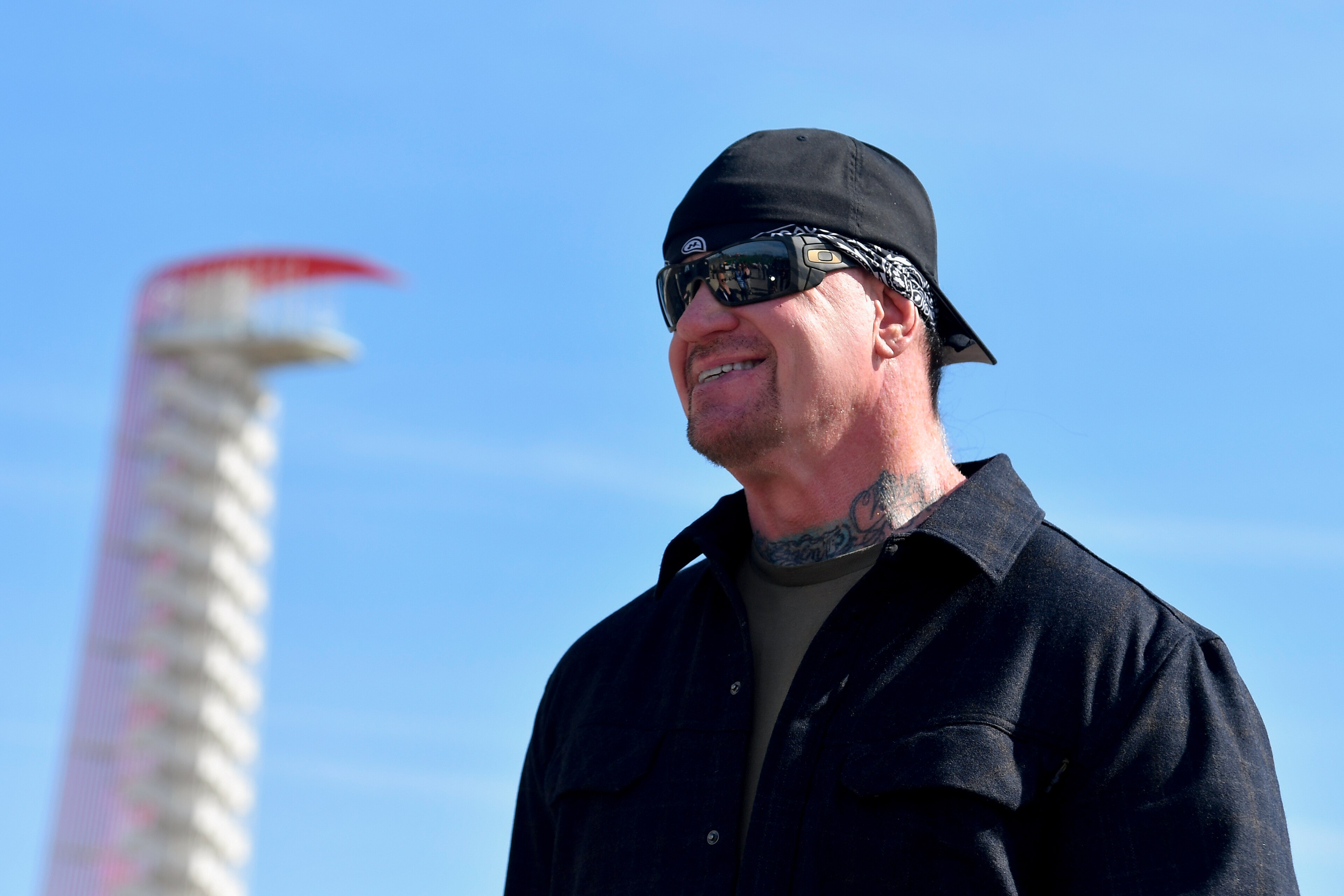 AUSTIN, TEXAS - MARCH 27: Professional wrestler The Undertaker posse for a photo prior to his pace car practice ride for the NASCAR Cup Series Echopark Automotive Grand Prix at Circuit of The Americas on March 27, 2022 in Austin, Texas. (Photo by Logan Riely/Getty Images)