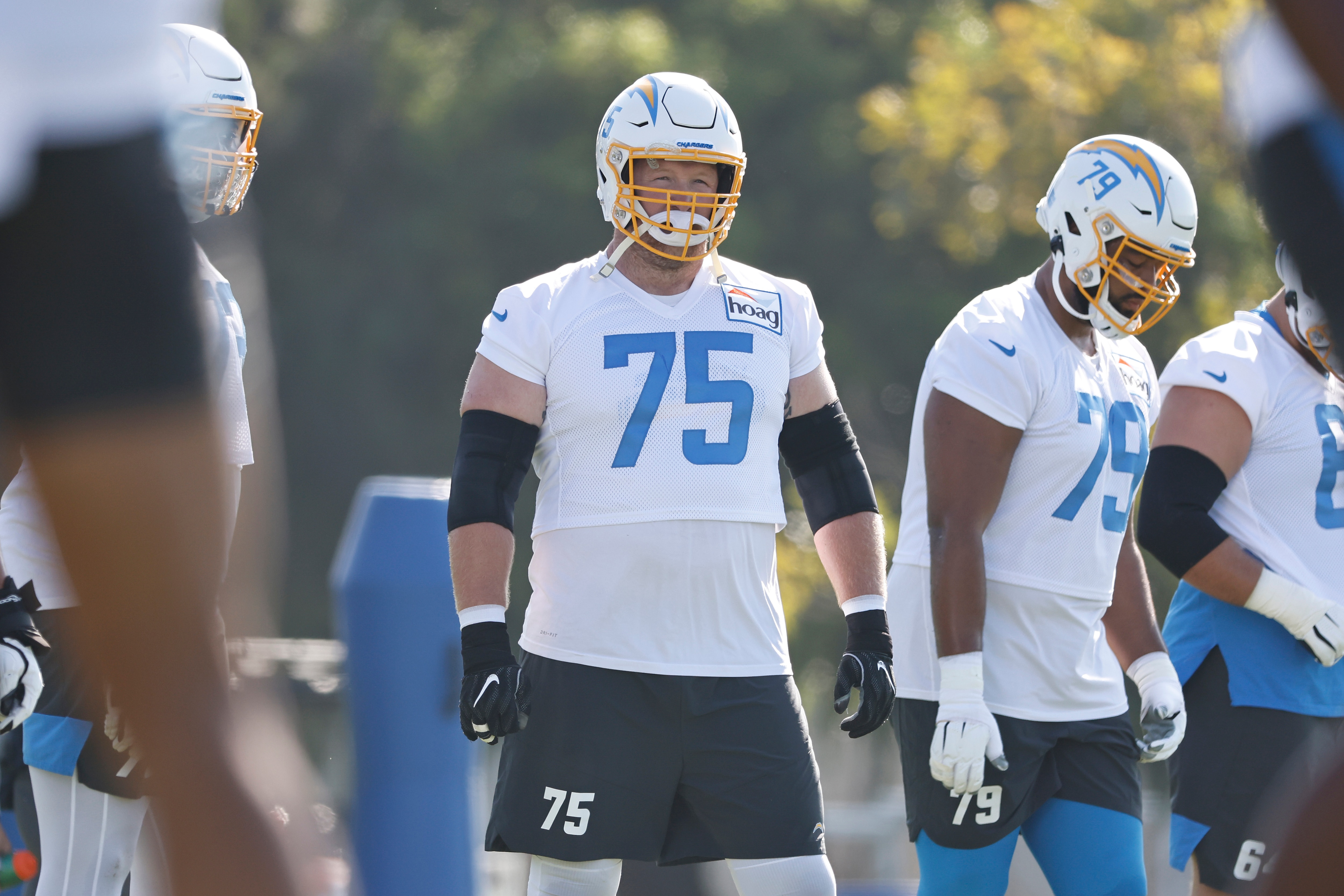 COSTA MESA, CALIFORNIA - JULY 28: Bryan Bulaga #75 of the Los Angeles Chargers warms up during Los Angeles Chargers Training Camp at Jack Hammett Sports Complex on July 28, 2021 in Costa Mesa, California. (Photo by Michael Owens/Getty Images)