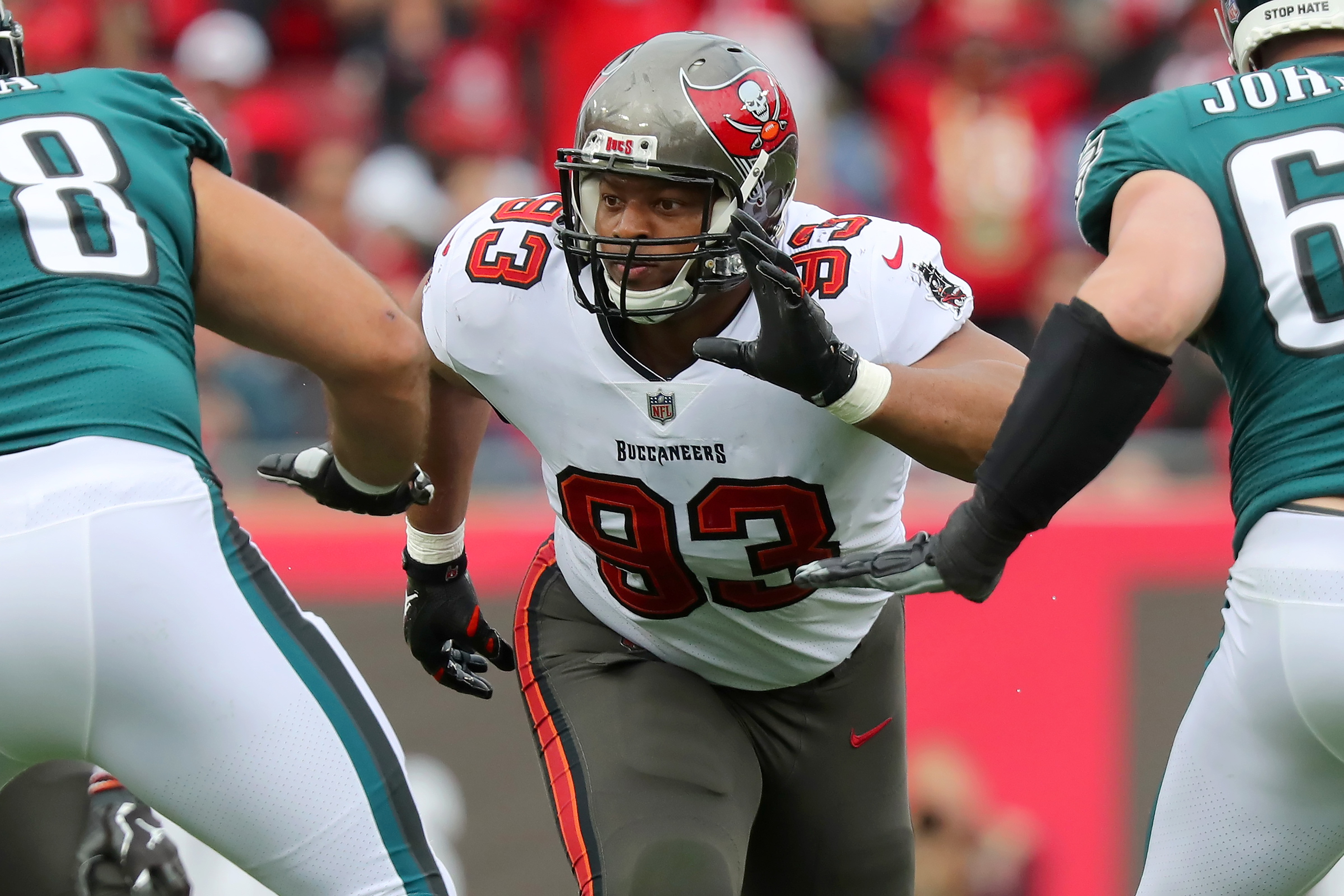 TAMPA, FL - JANUARY 16: Tampa Bay Buccaneers Defensive End Ndamukong Suh (93) rushes the passer during the NFL Wild Card game between the Philadelphia Eagles and the Tampa Bay Buccaneers on January 16, 2022 at Raymond James Stadium in Tampa, Florida. (Photo by Cliff Welch/Icon Sportswire via Getty Images)